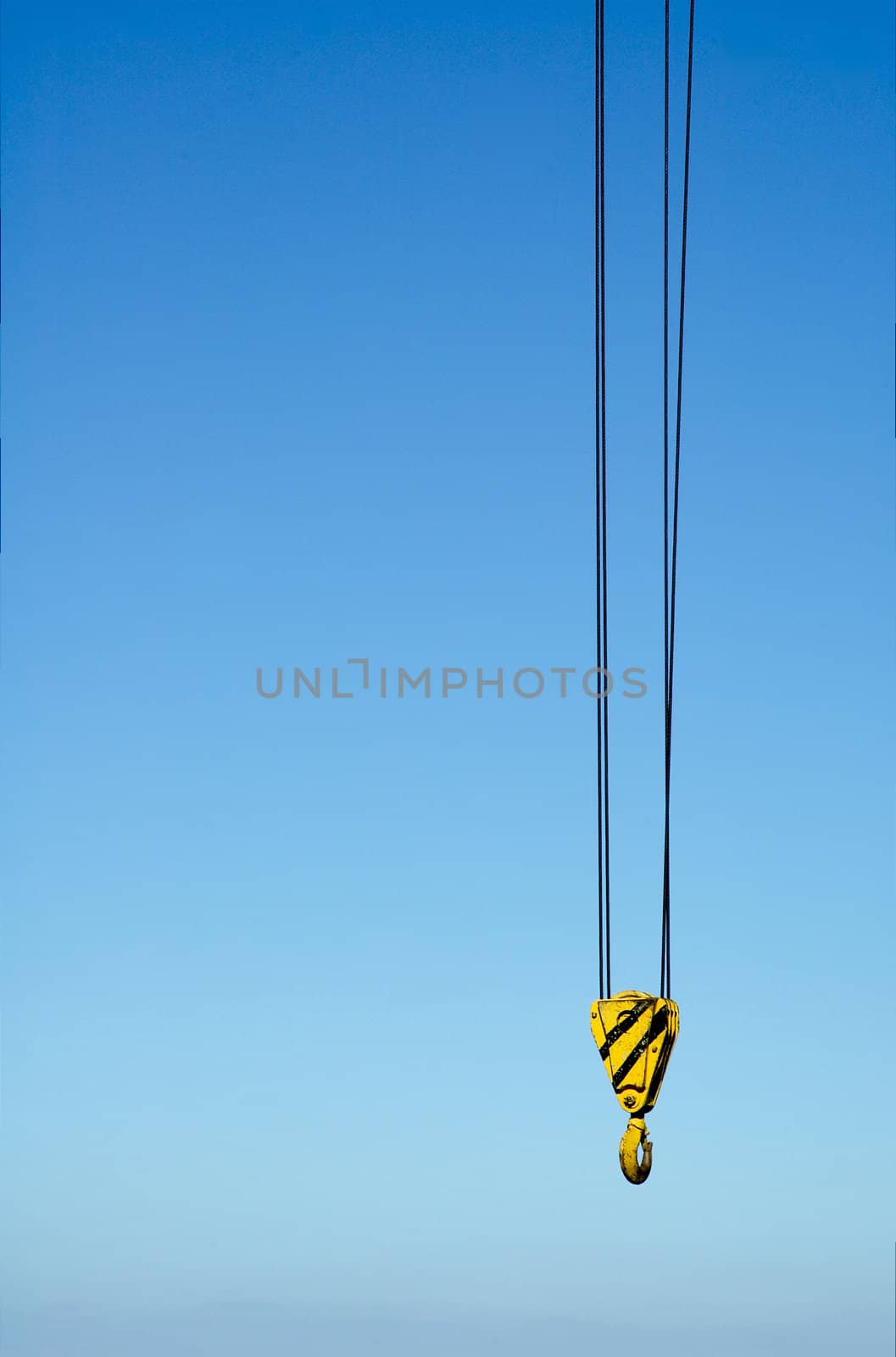 hook from crane against blue sky
