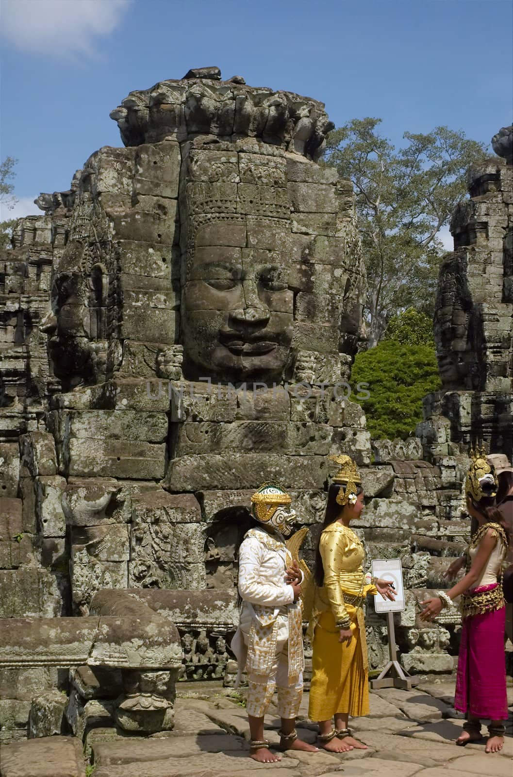 Cambodian with traditional clothes at Angkor temple 