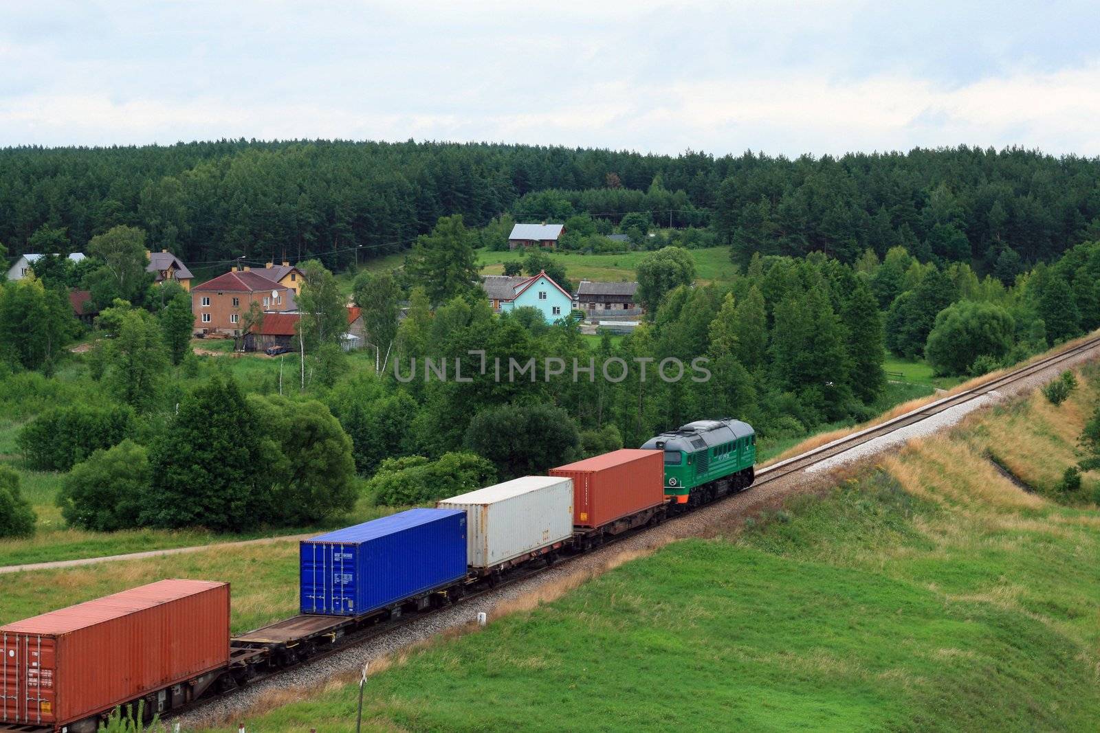 Landscape for container train passing the village