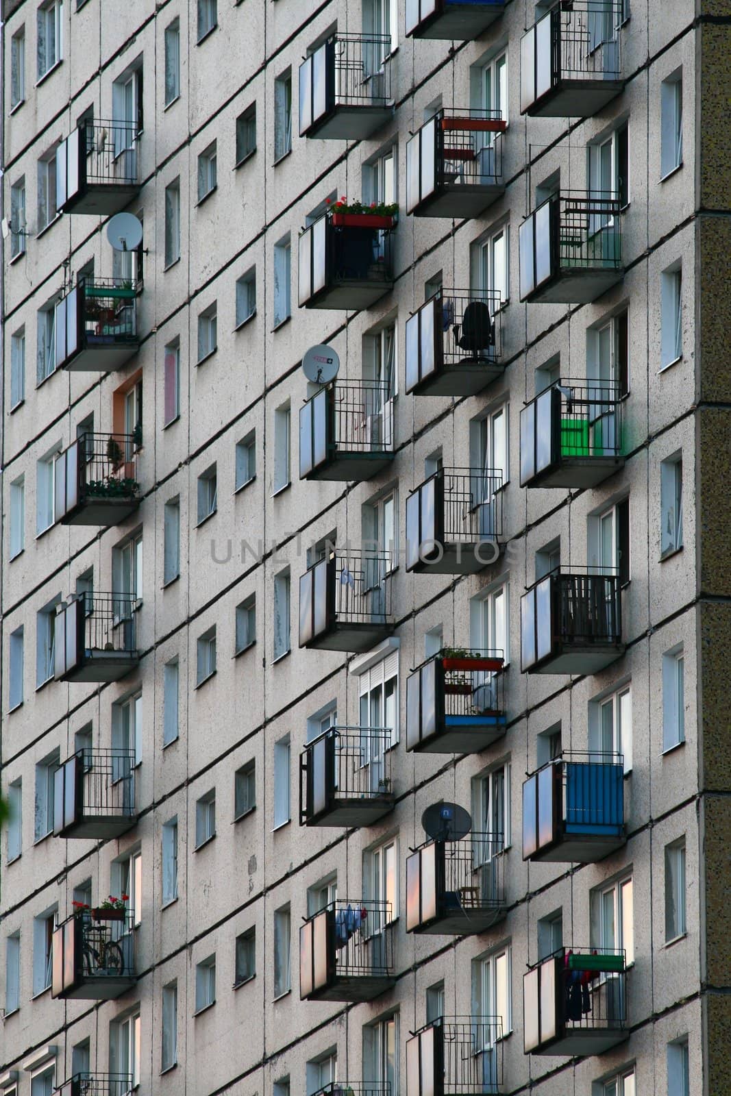 Side view of grey block with flat houses