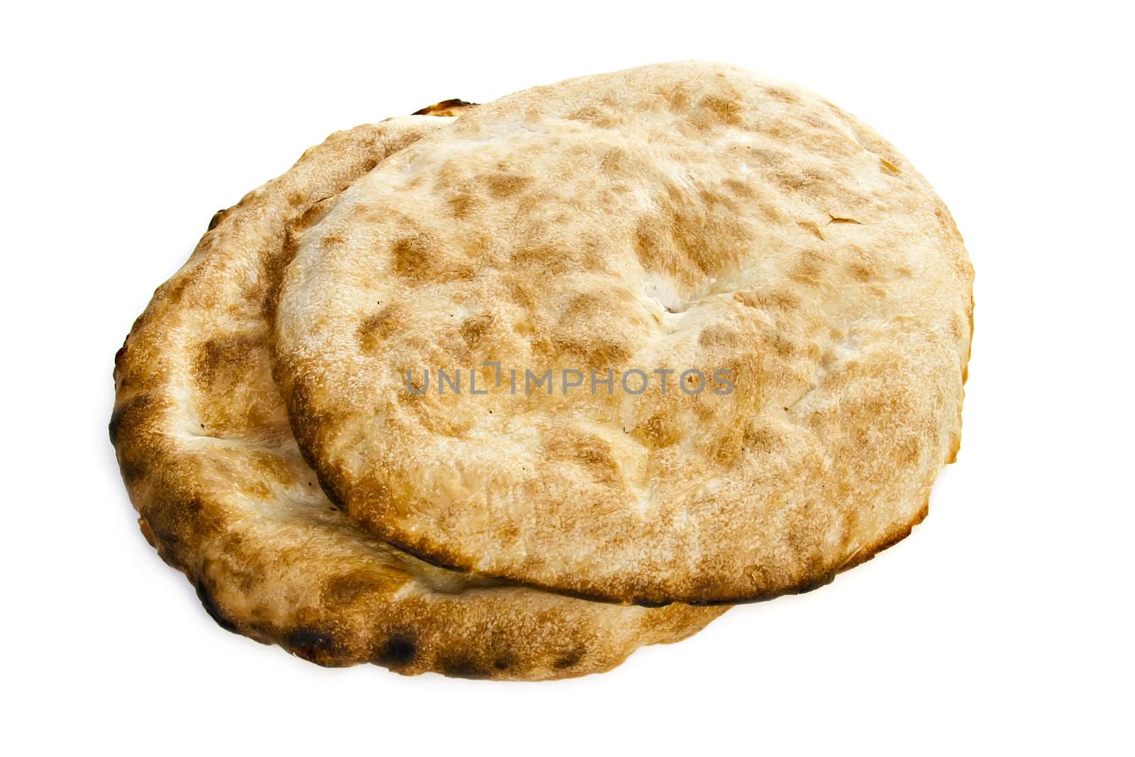 Two pita bread on a white background.
