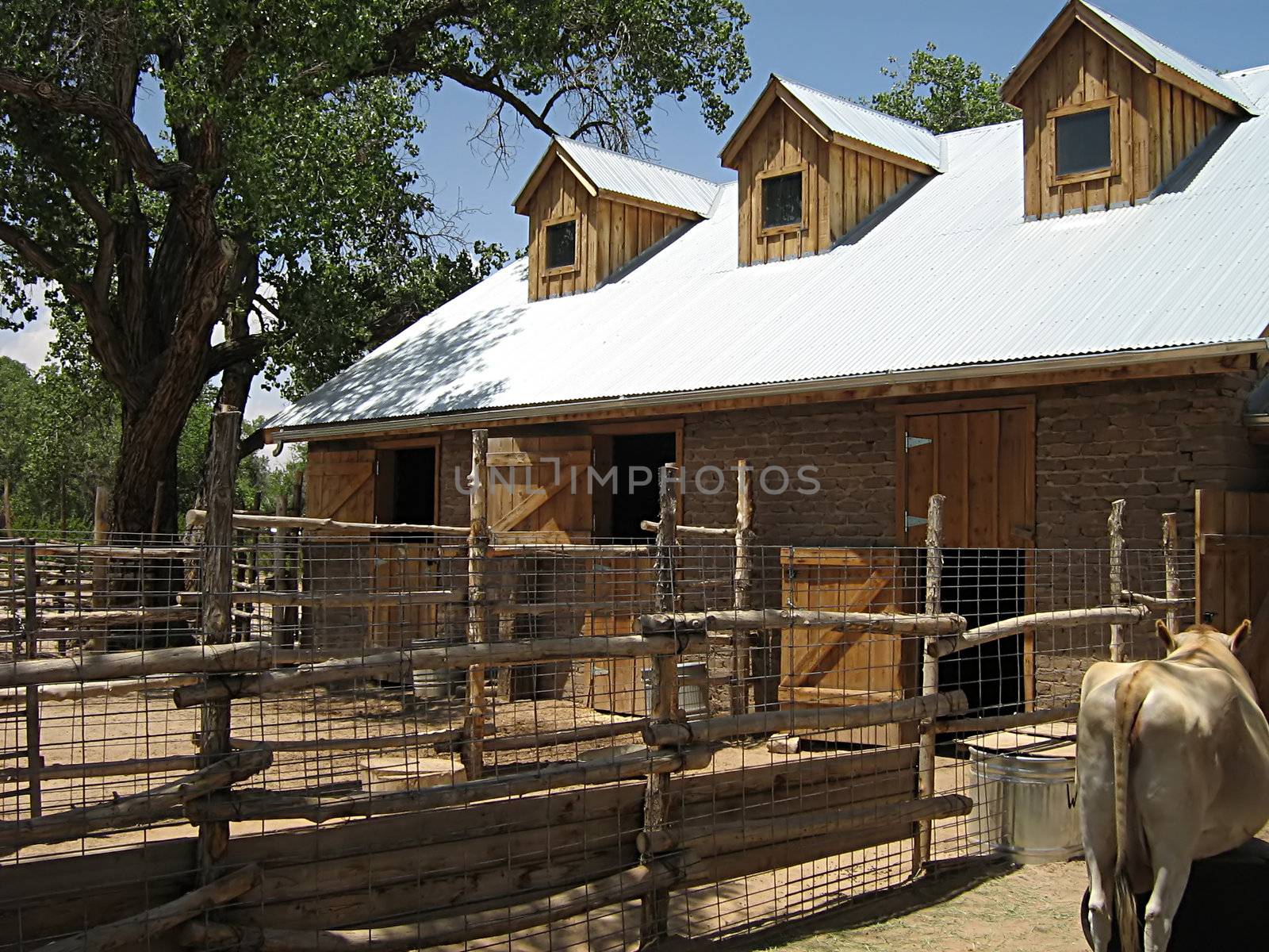A photograph of a barn detailing its architecture.