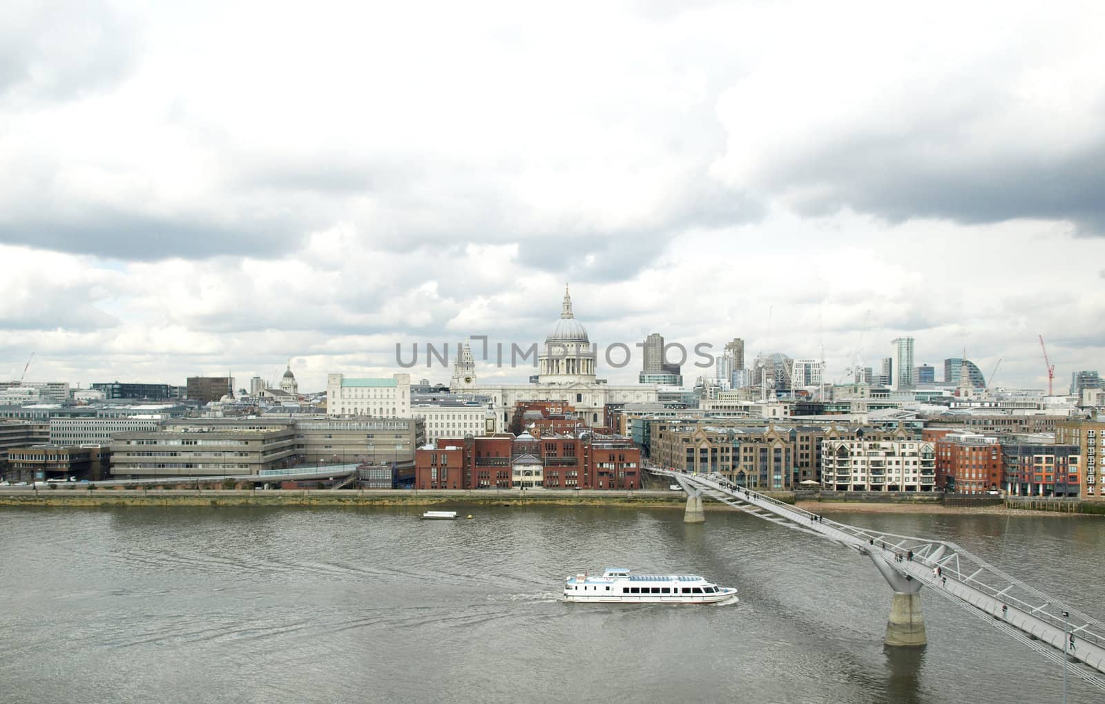 Wide angle view of Saint Paul's Cathedral in the City of London, UK under a typica British rainy weather