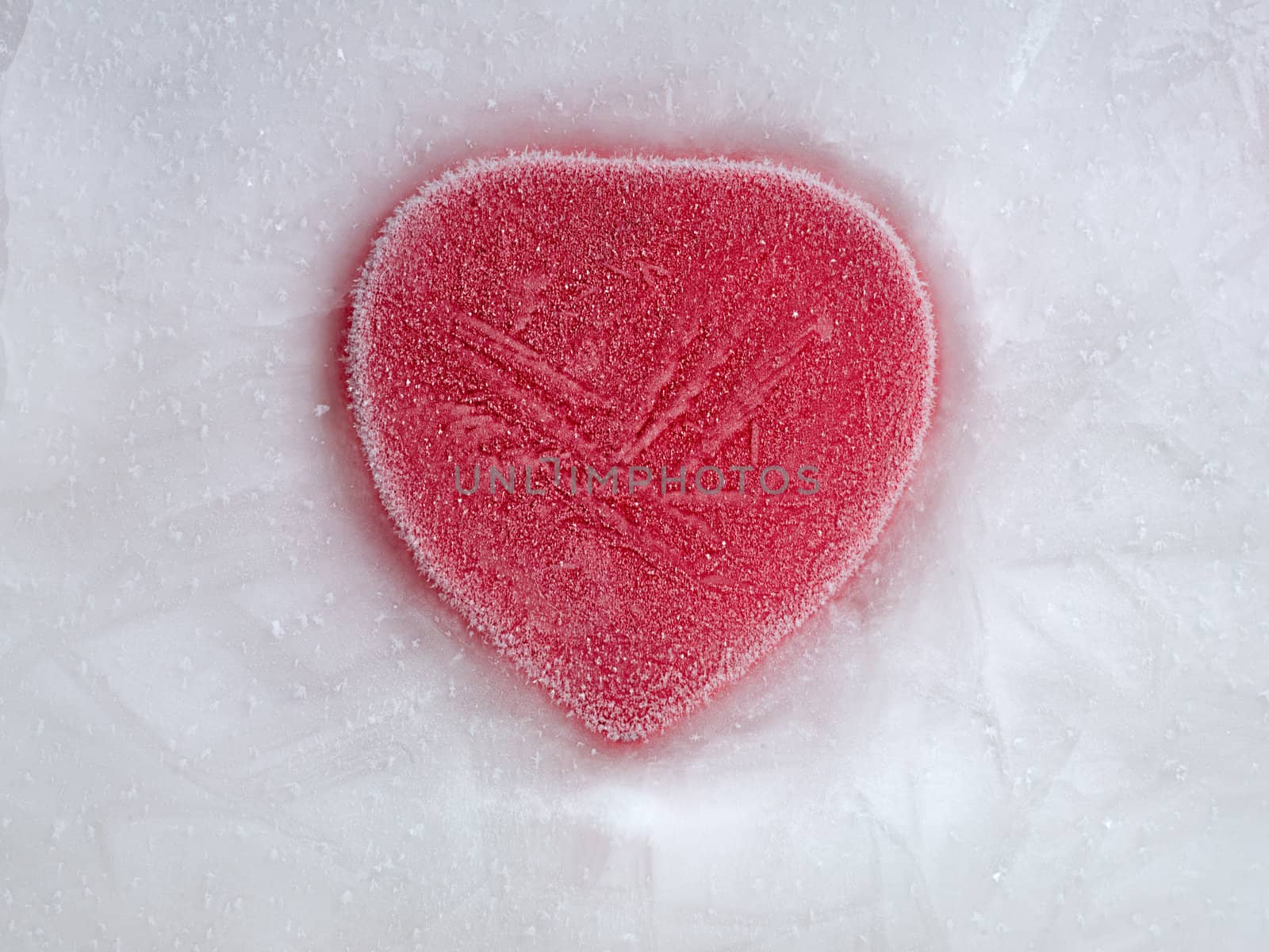 Frozen beautiful red heart with Ice Crystal