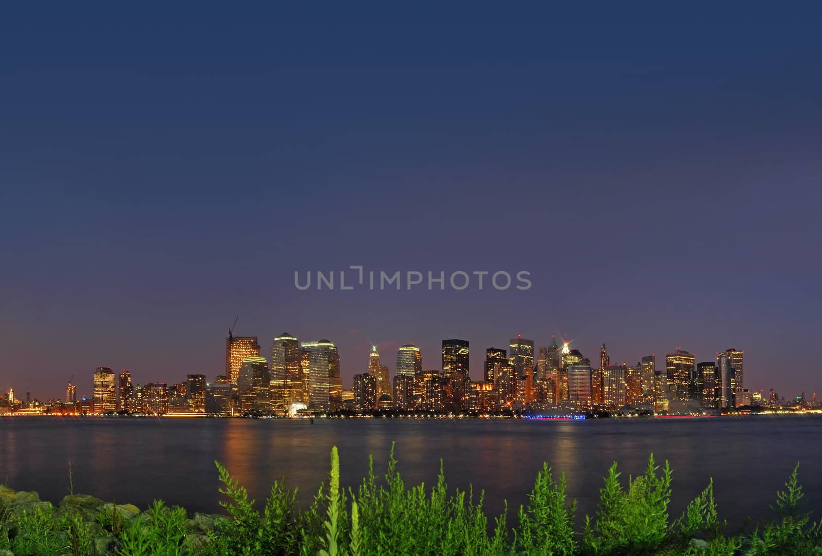 new york at night, photo taken from jersey city across hudson river