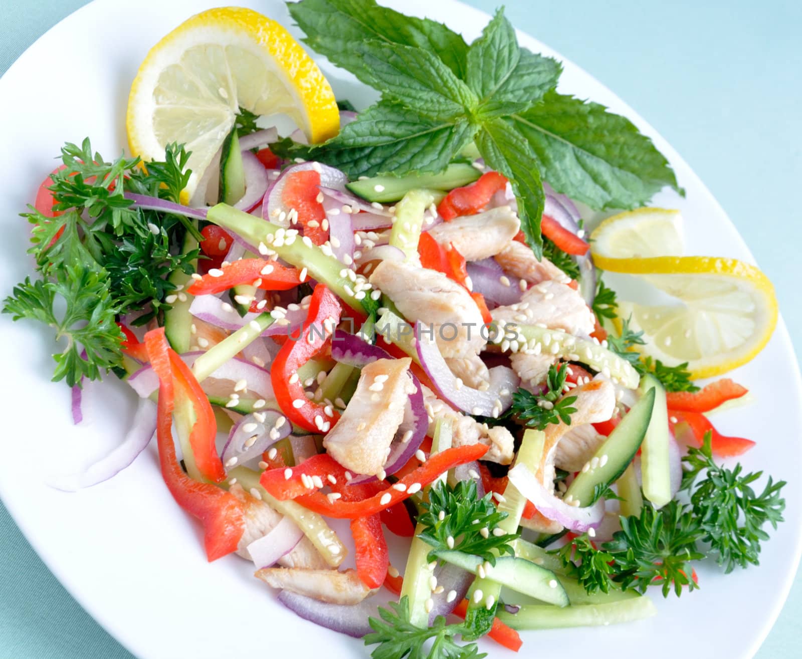 fresh vegetable salad with chicken and sesame