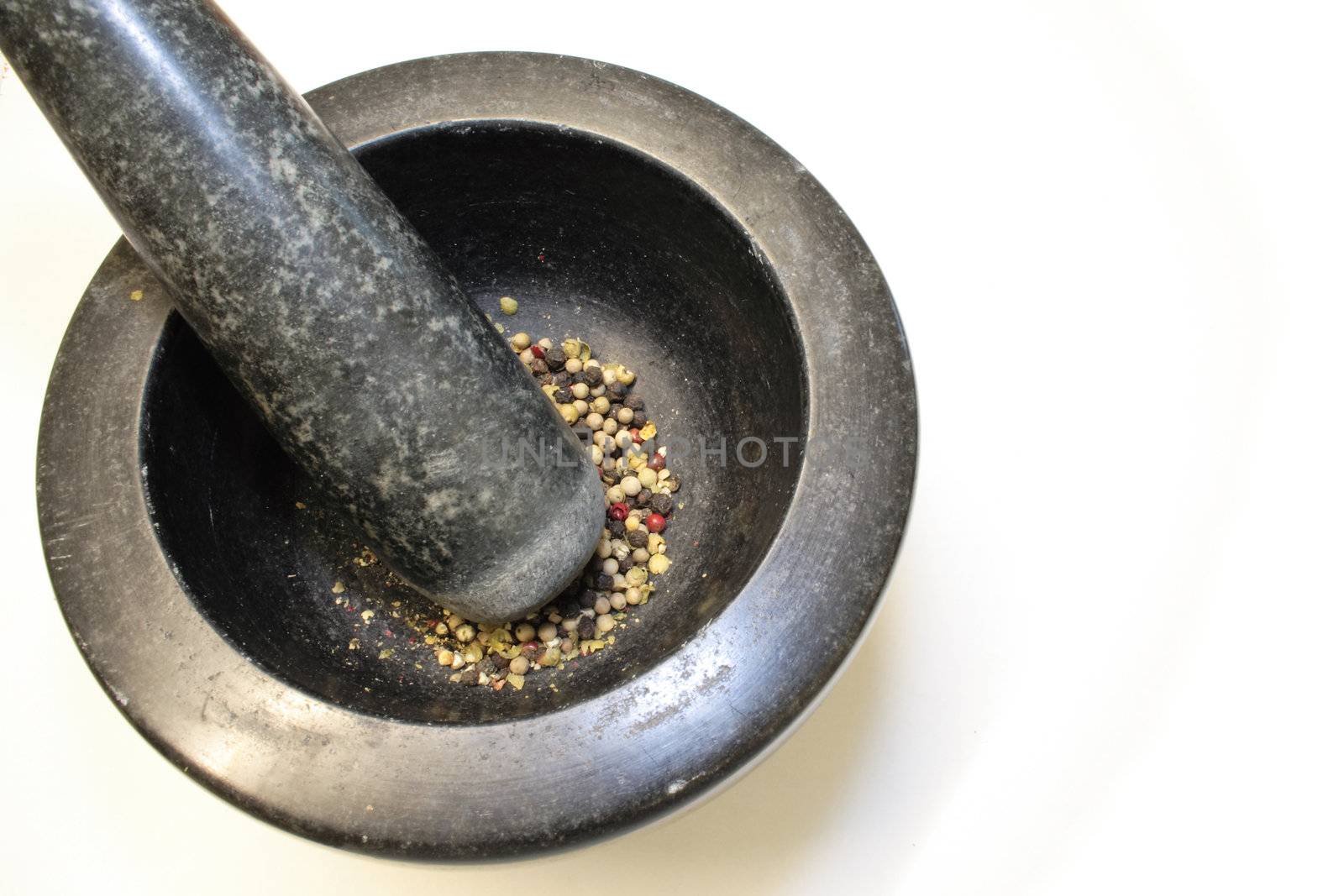 grinding peppercorns by leafy