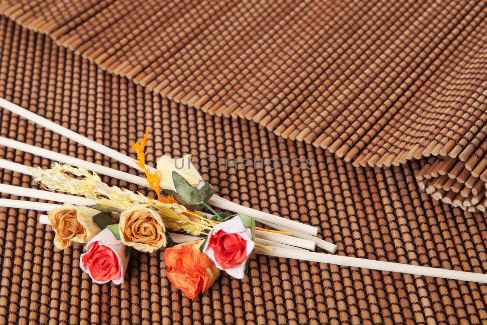 Brown mat and small dry flowers