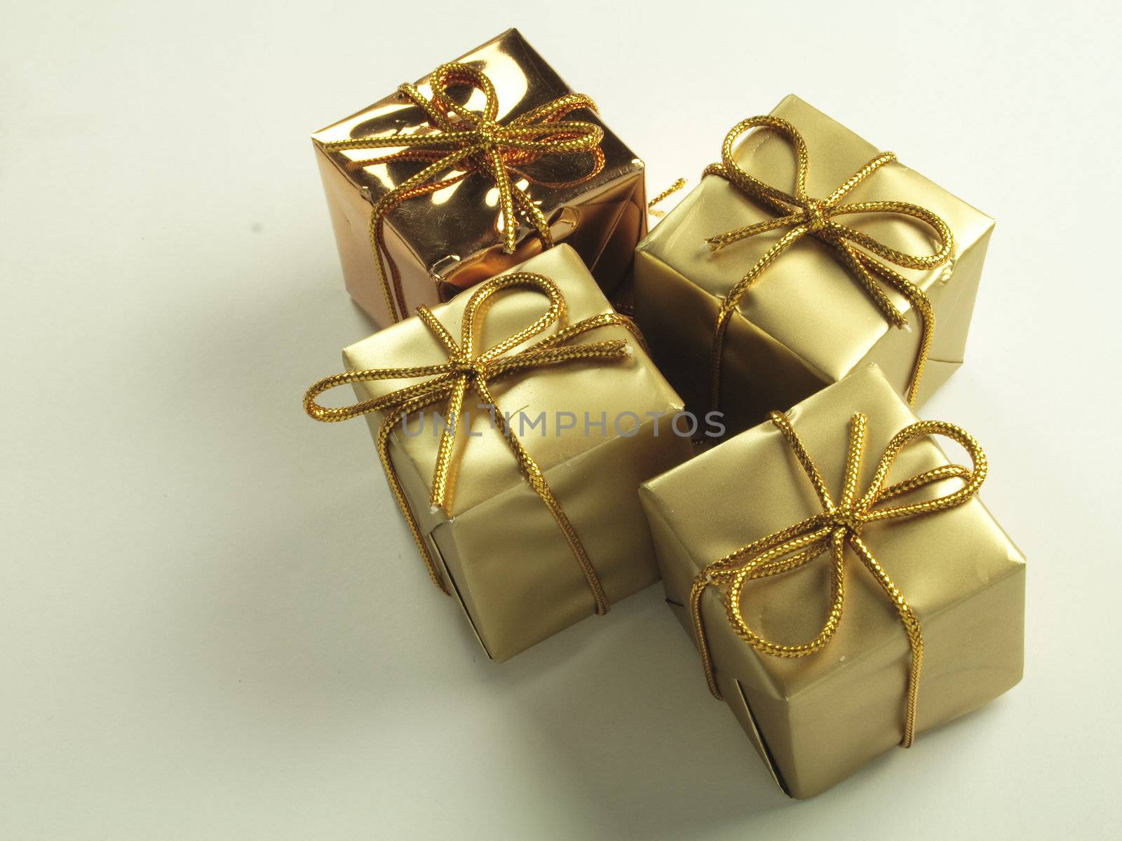 gold present box decorations by leafy