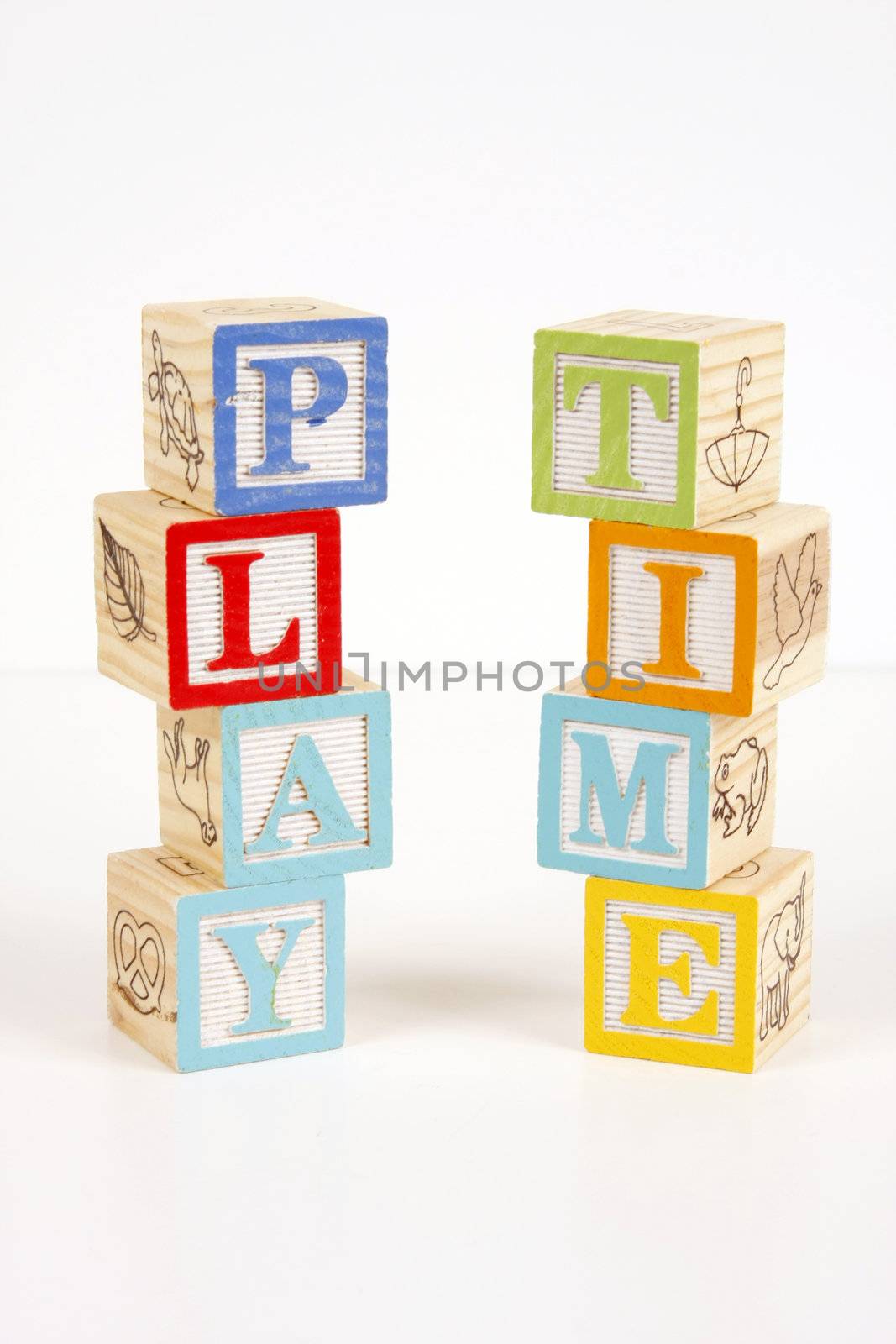 Colorful childrens blocks spell the words play time.