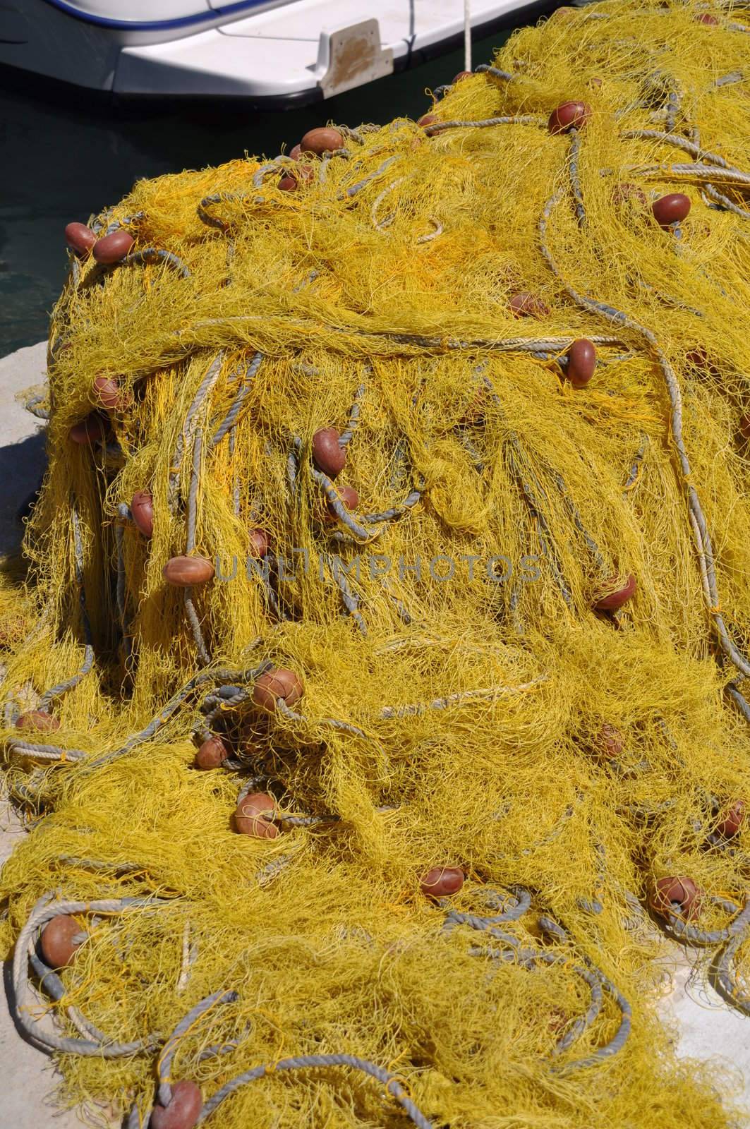 bright yellow fishing net on Kalymnos island, Greece