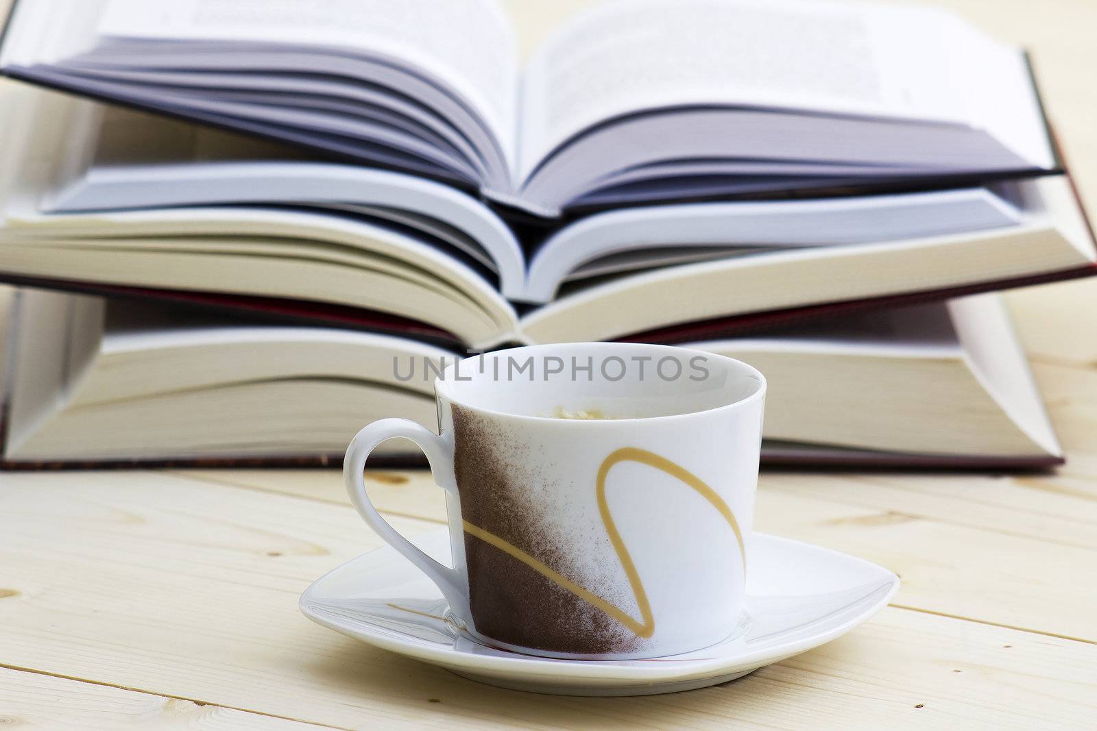 cup of coffee and books