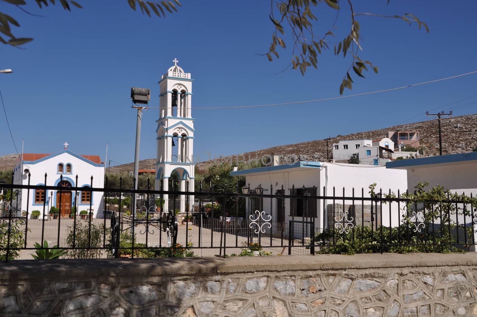 beautiful blue and white church/tower in Pserimos island, Greece