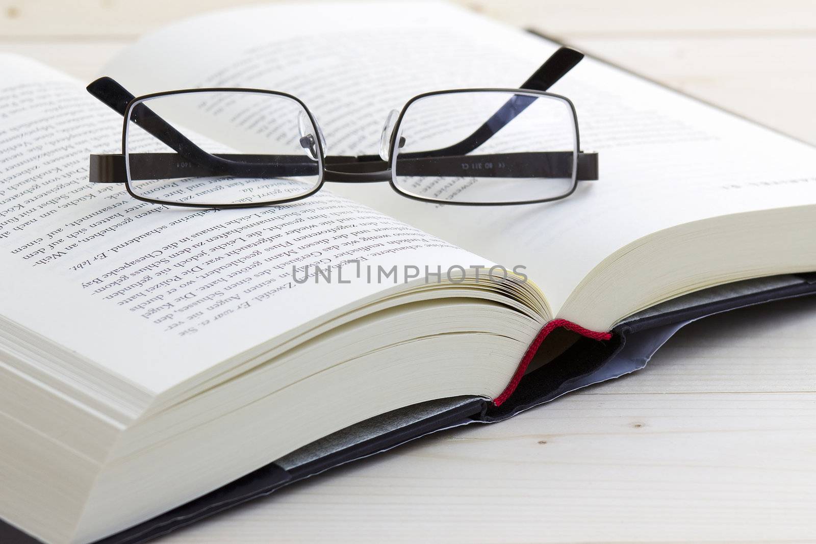 opened book and glasses