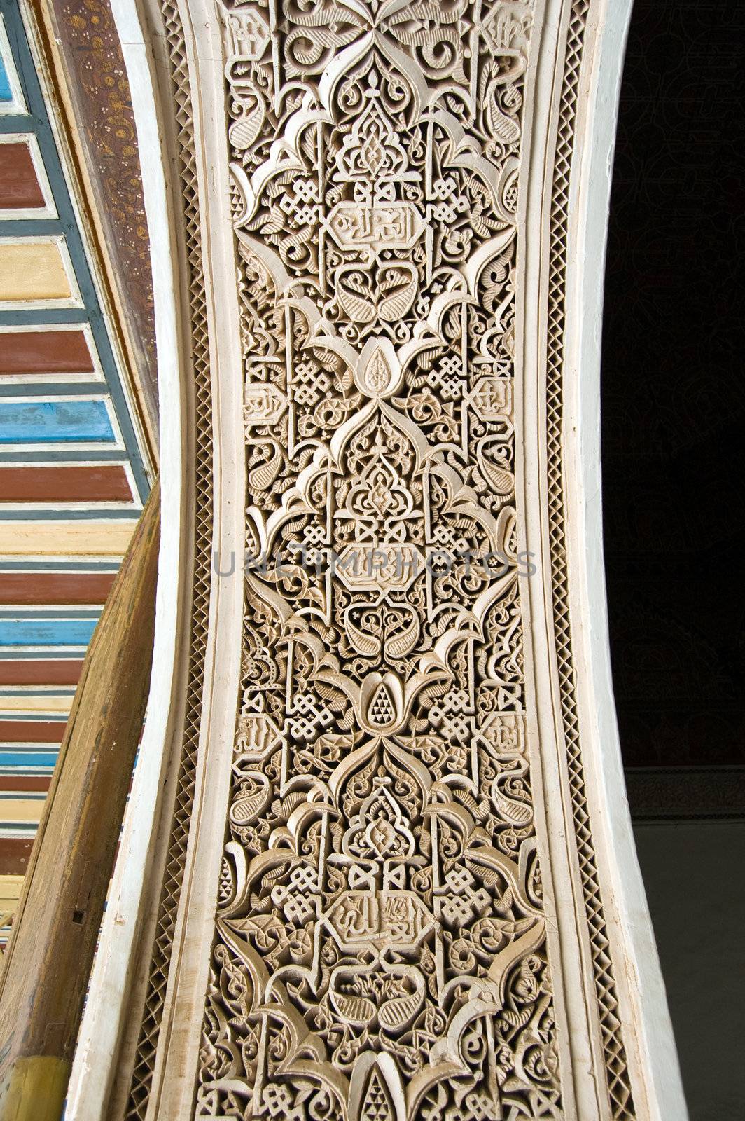 A detail of a Moorish style stucco of an arch in Marrakesh