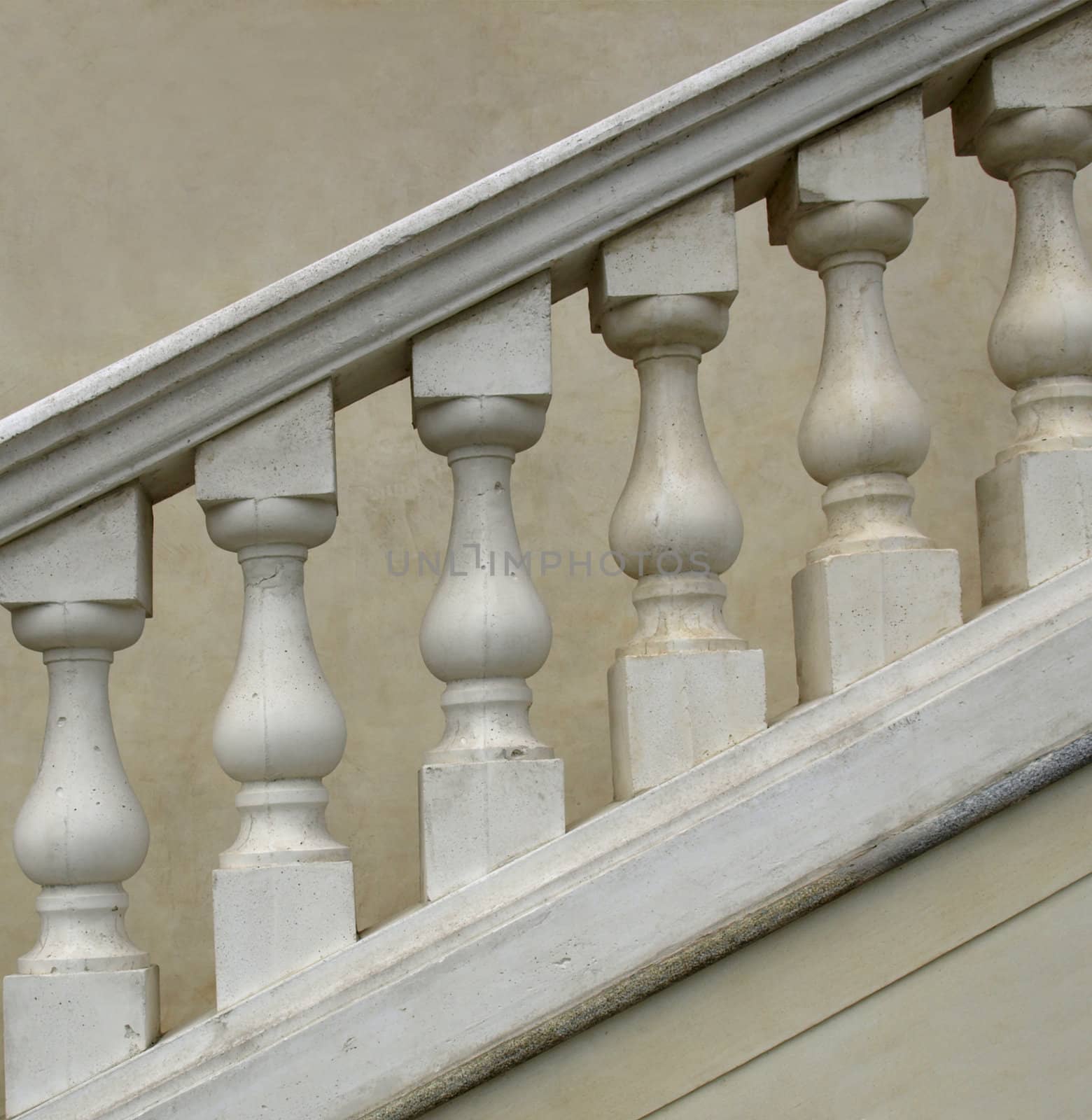 Stone baroque balaustrade as a staircase handrail