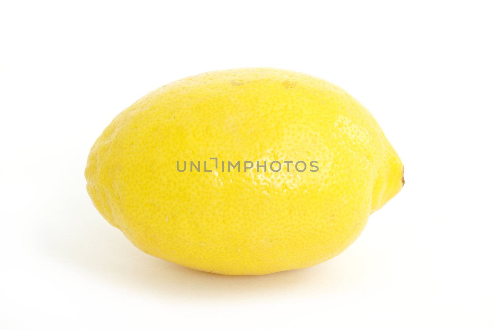 A fresh whole lemon on white background.