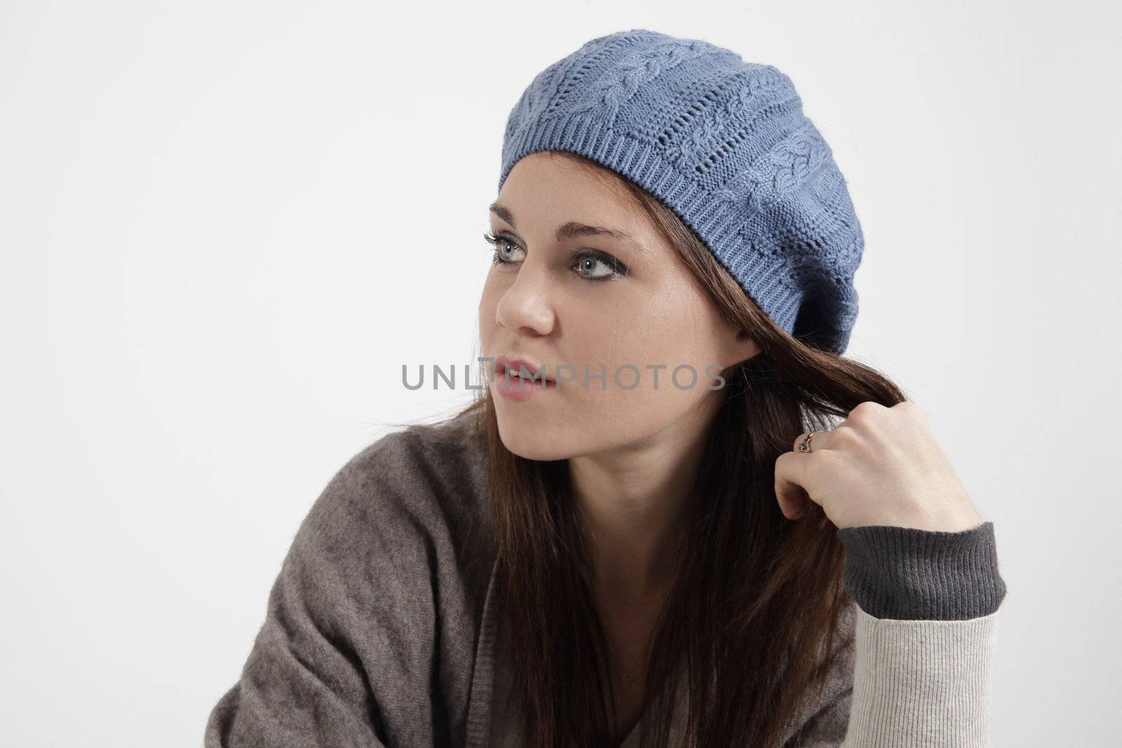 Young woman with blue cap