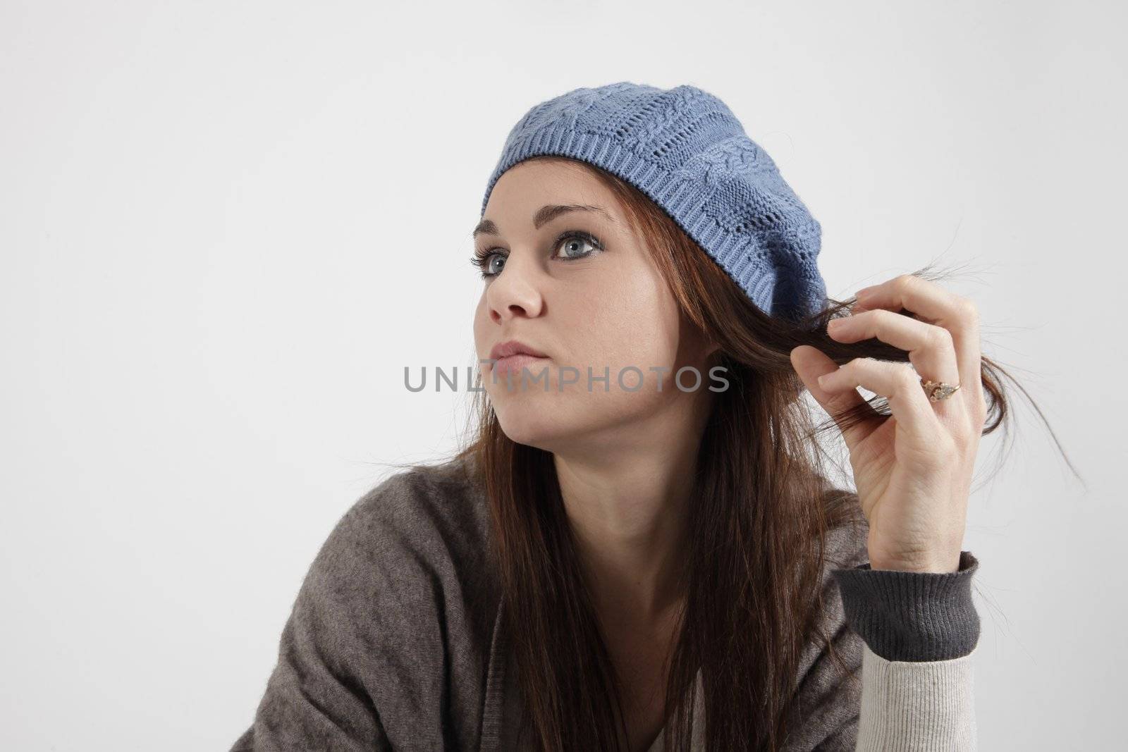 Young woman with blue cap