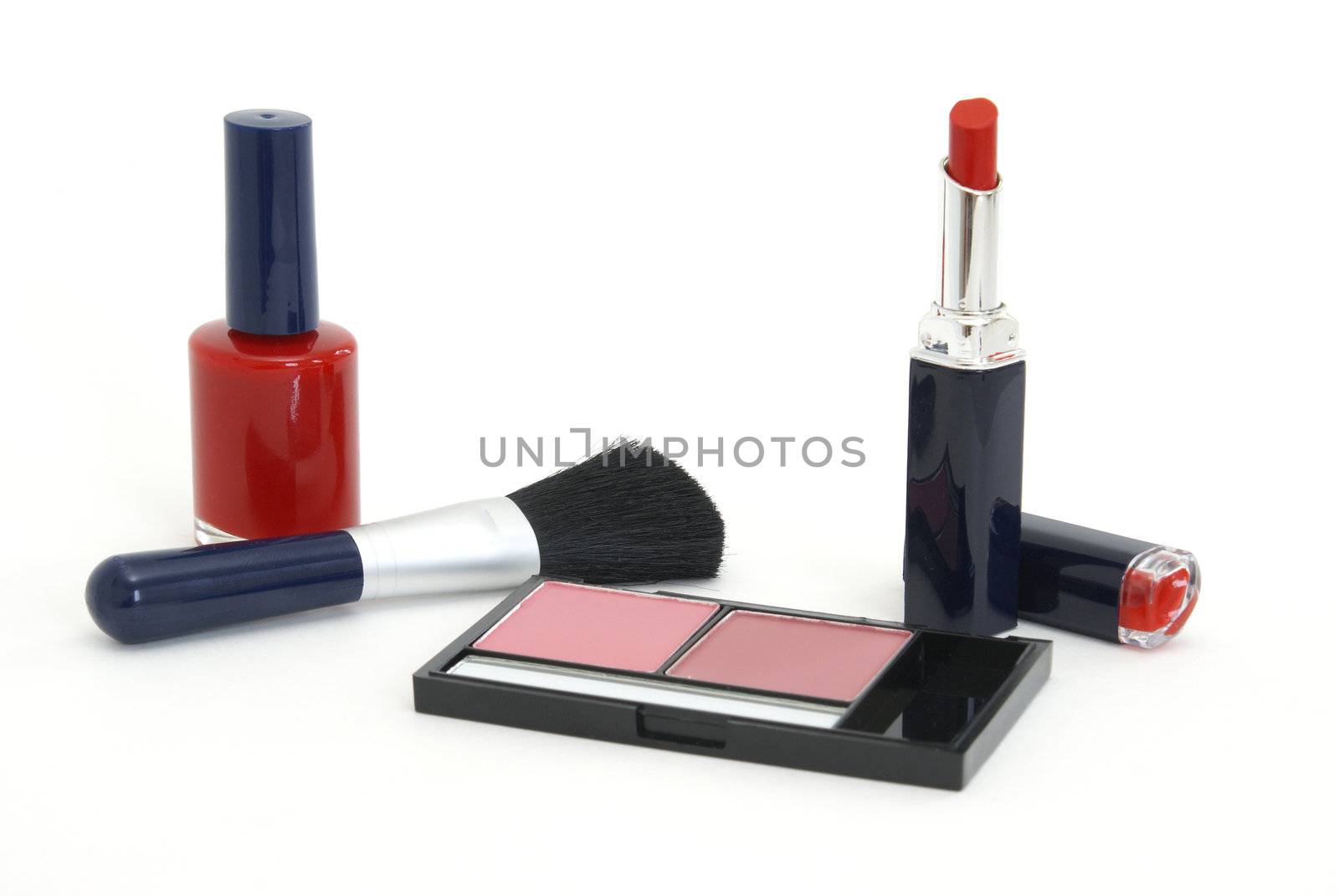 Various items of a womans makeup set.