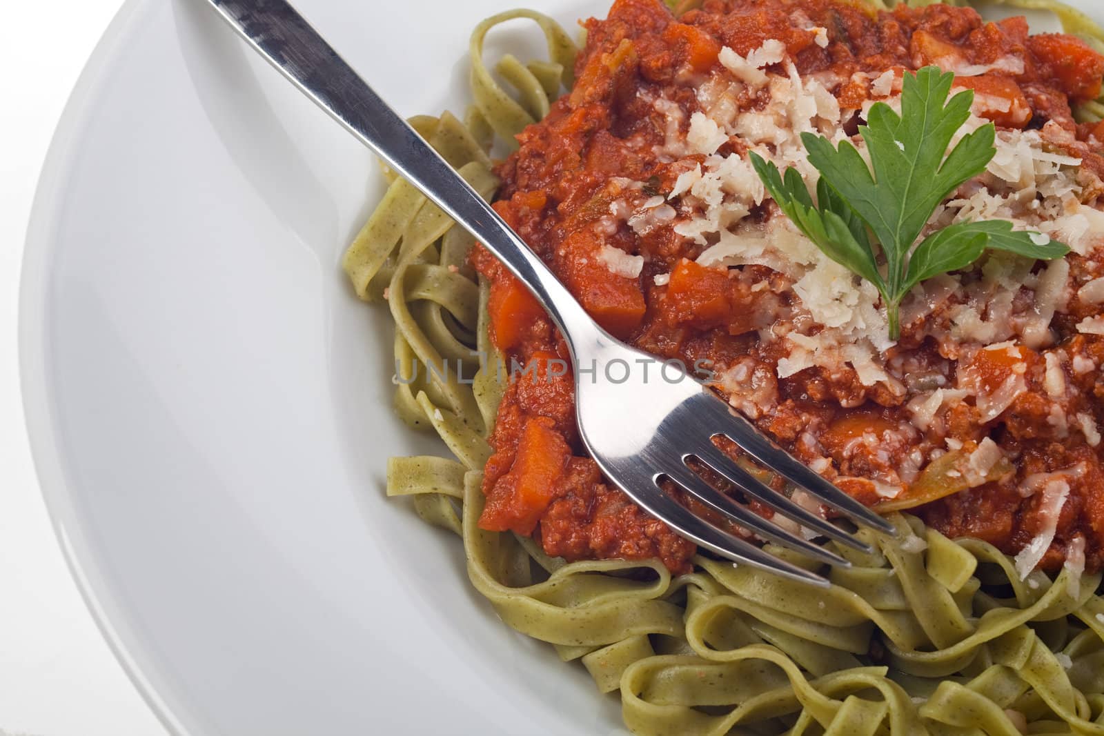 tagliatelle with sauce bolognaise in white plates by bernjuer