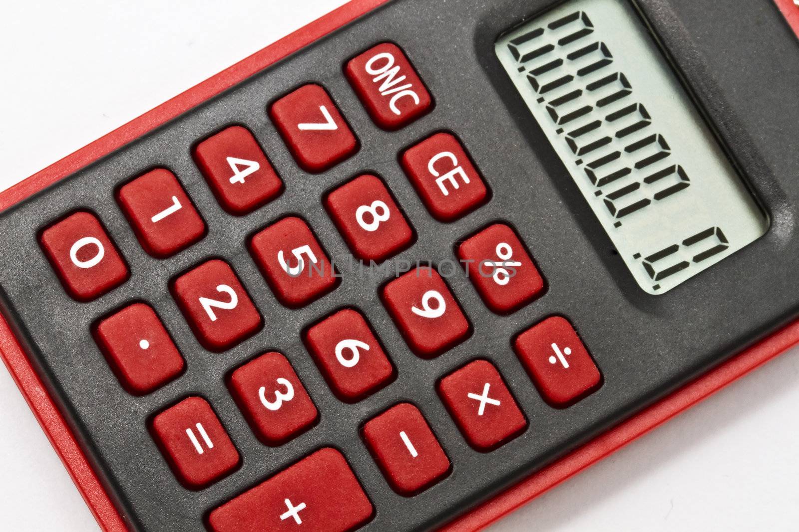 Mini red calculator isolated on white background