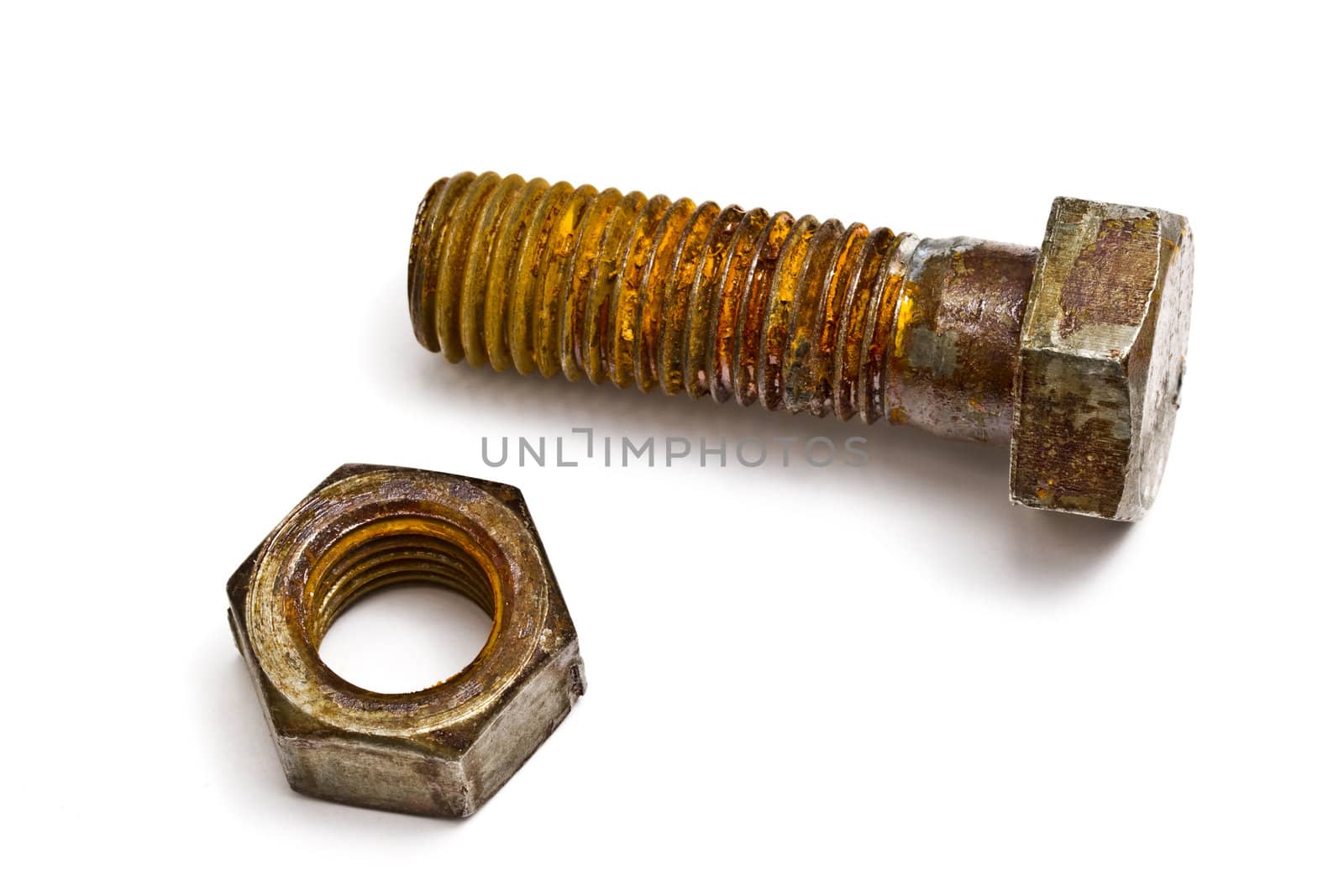 Rusty nut and bolt isolated on white background 
