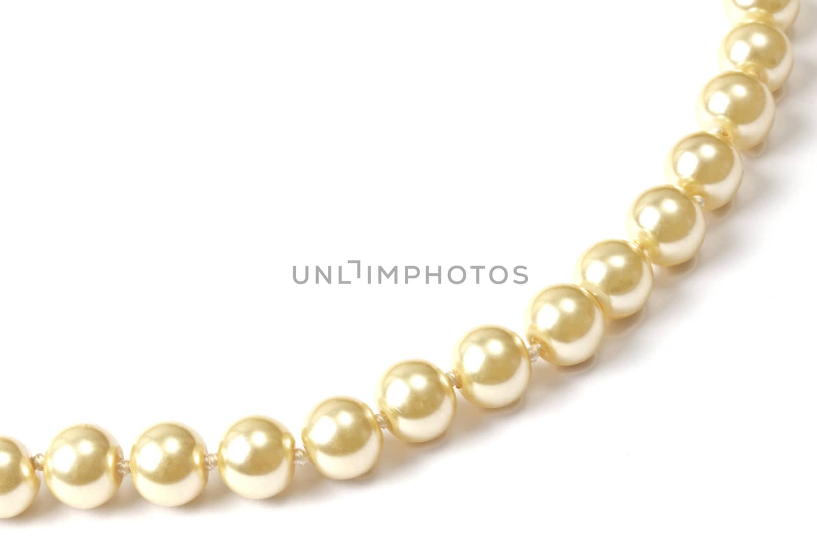 Beautiful string of beads isolated on white background 