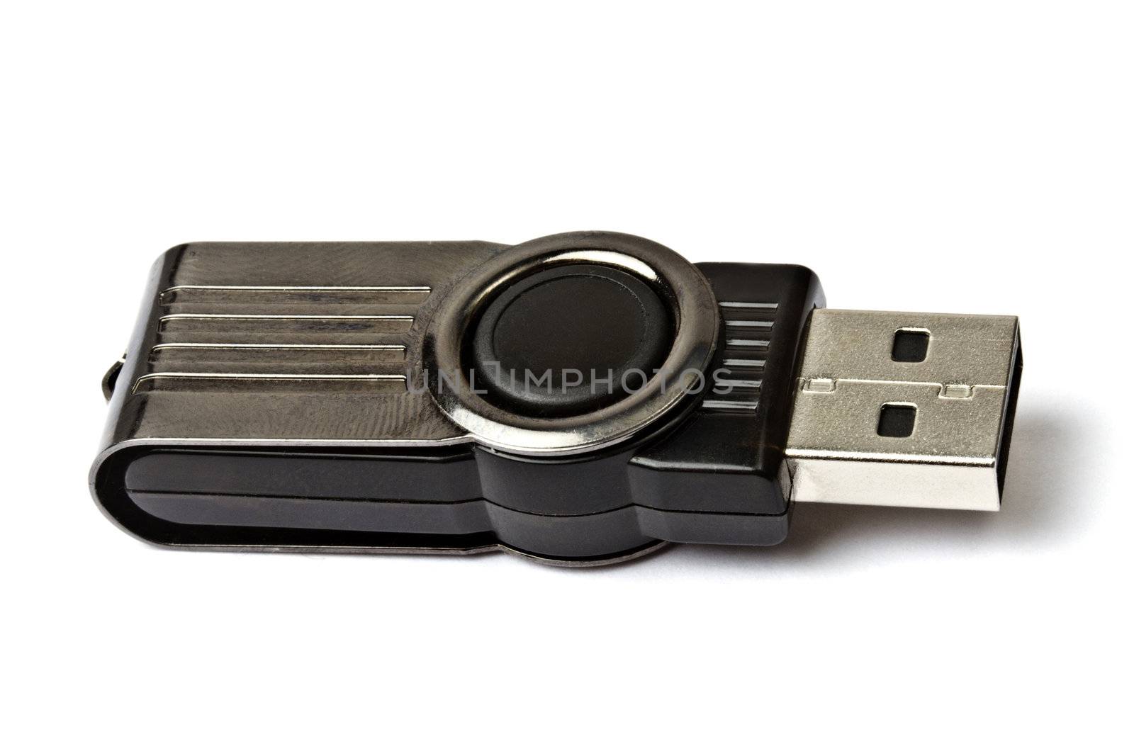 A black USB memory stick isolated on white background 