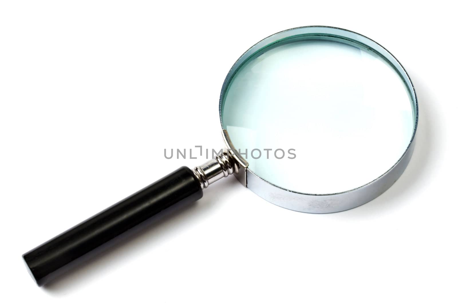 Magnifying glass on white background closeup 