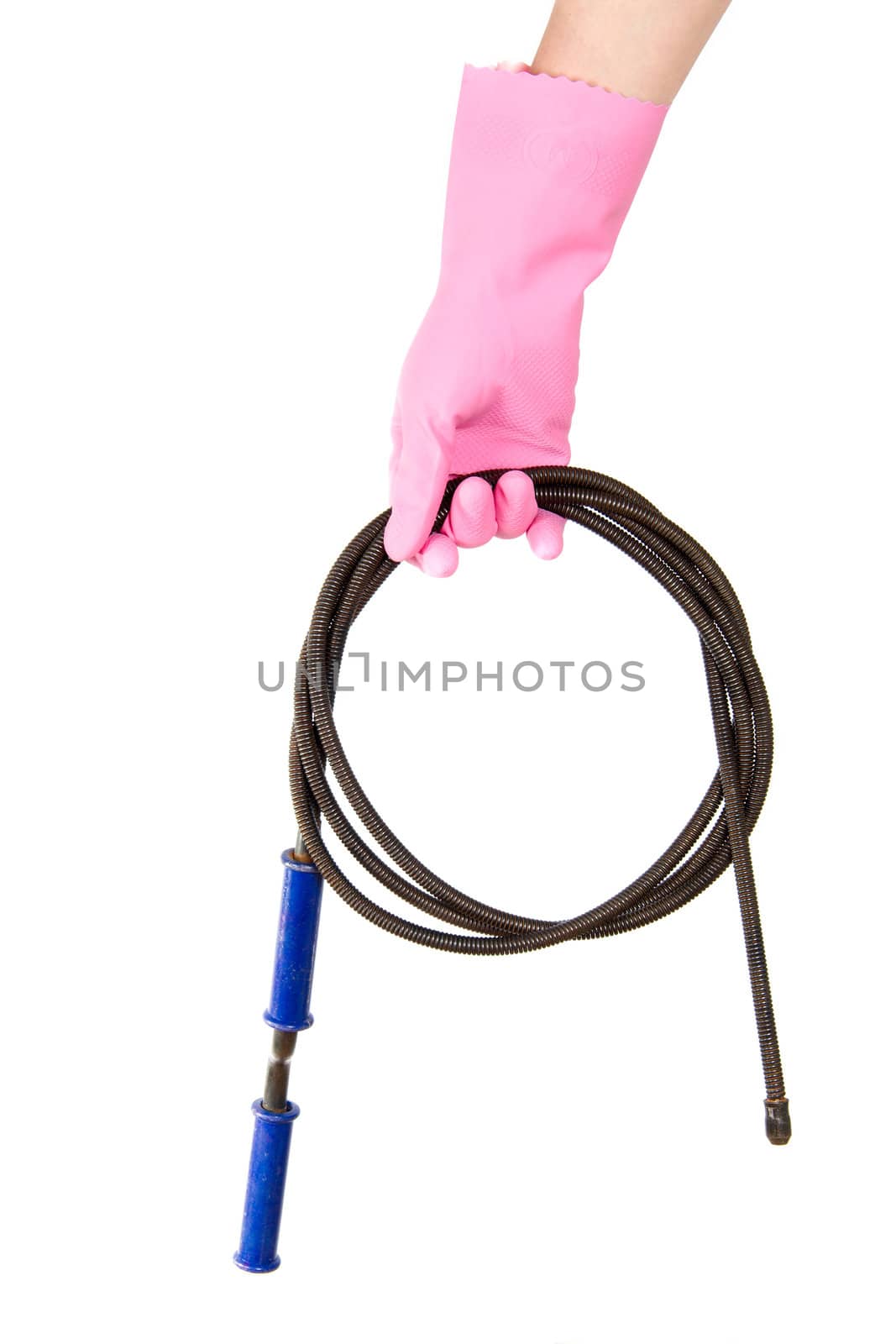 Female hand in a pink glove keeps a hawser for the water drain, isolated, on a white background
