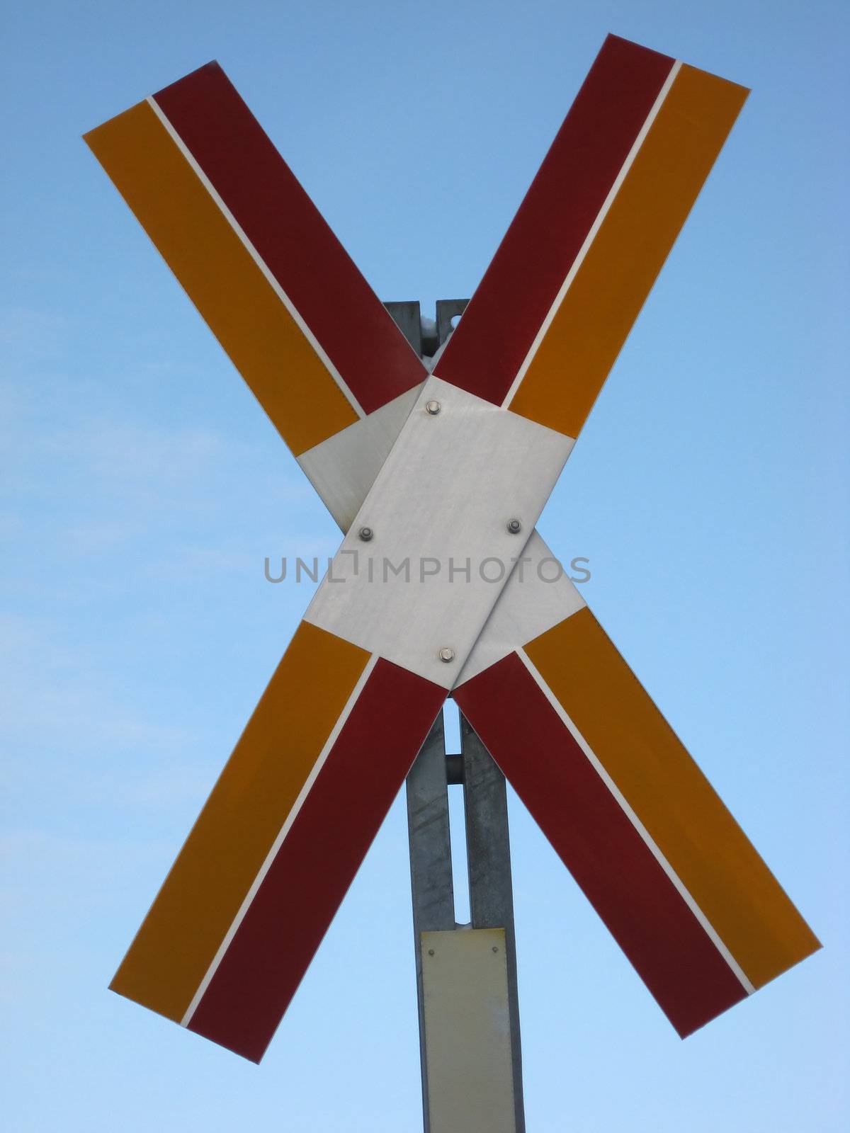 Unknown sign closeup in the blue sky