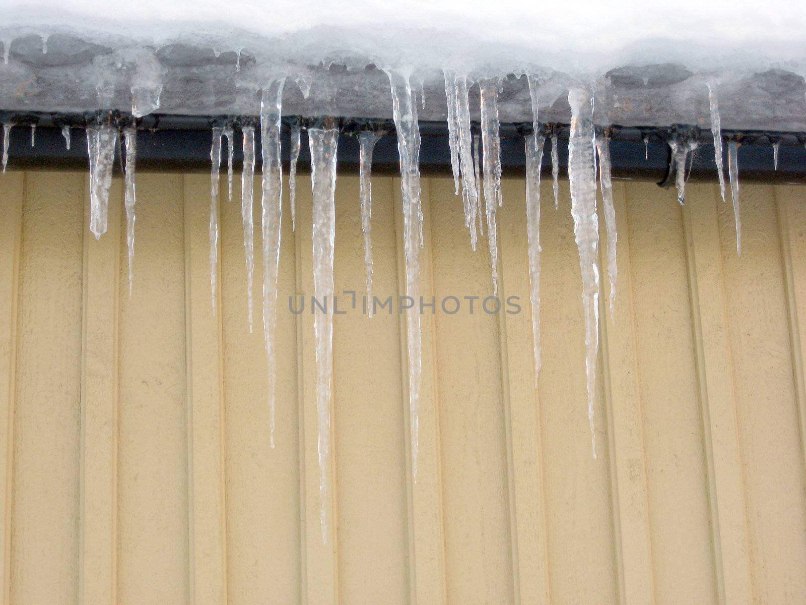 Melting icicles on the roof