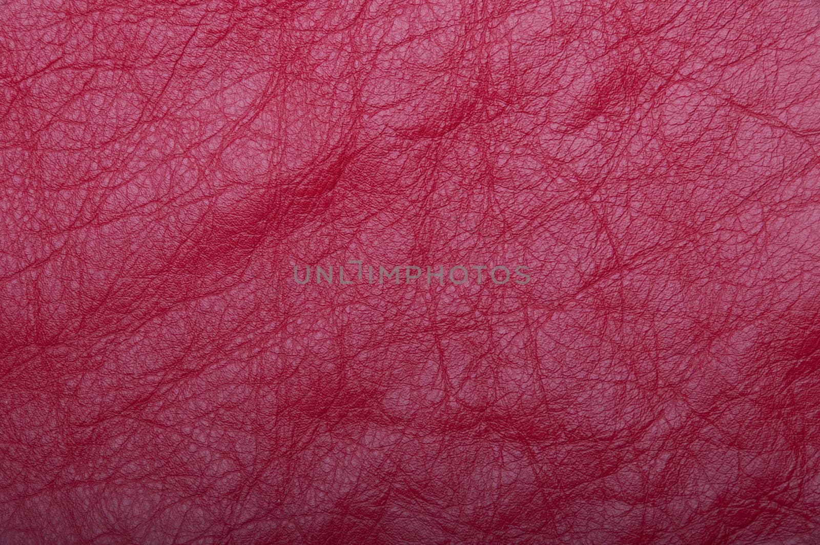 gorgeous red leather scrap background or texture