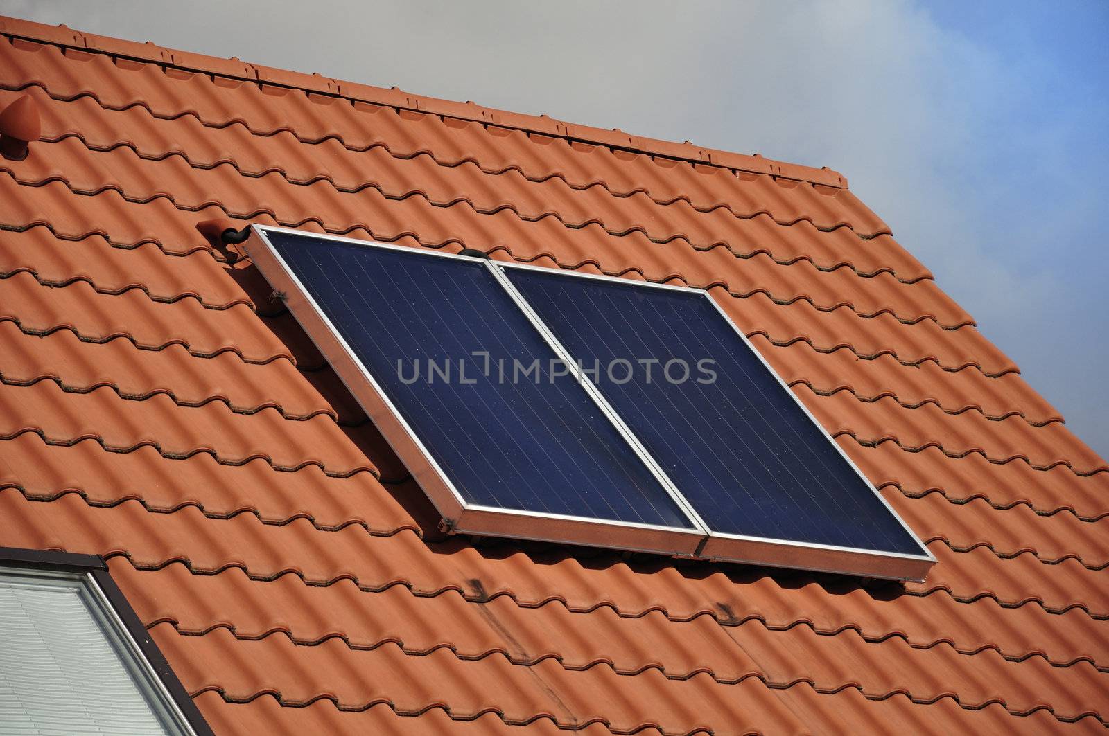 Solar panel on the roof of a private house.

