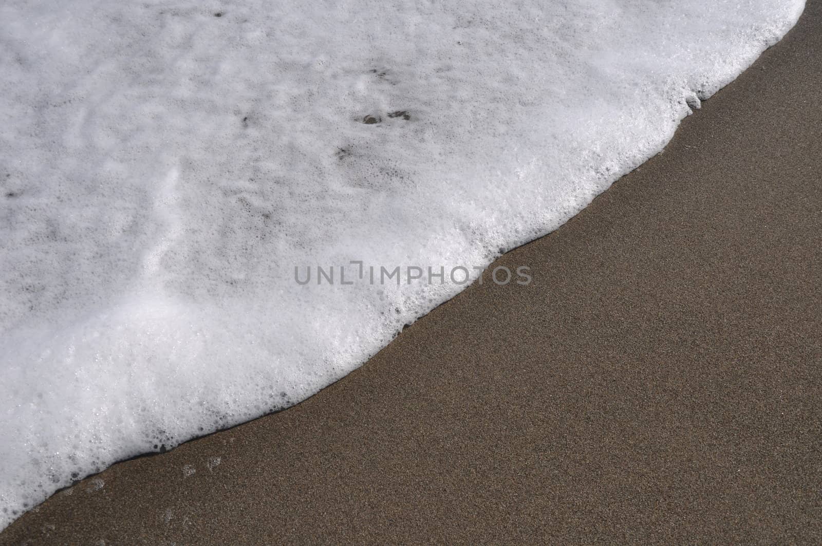 gorgeous beach sand and sea foam (copy-space available)