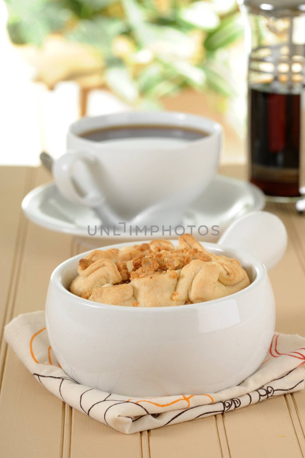 Single serving of homemade apple pie and coffee.