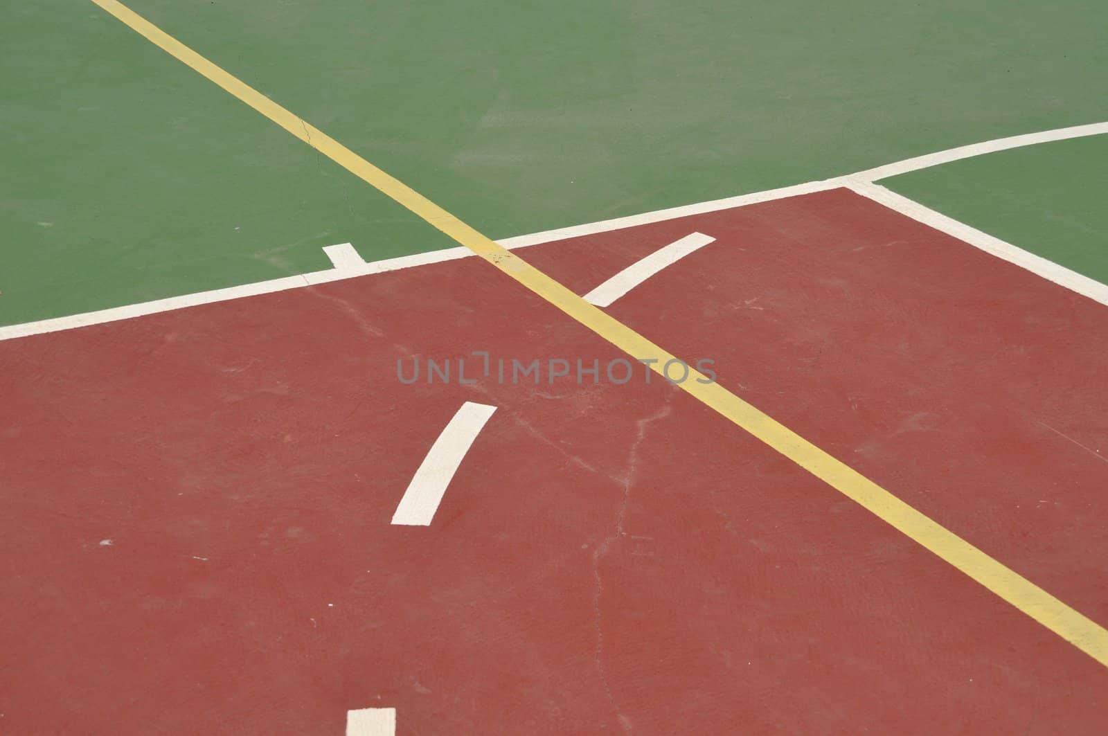 colorful basketball lines on an outdoor court