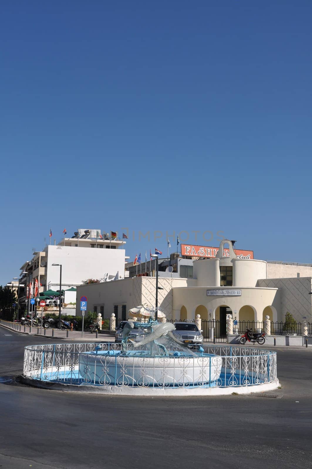 KOS - AUGUST 26 2010: famous dolphin square on August 26, 2010 in Kos, GREECE