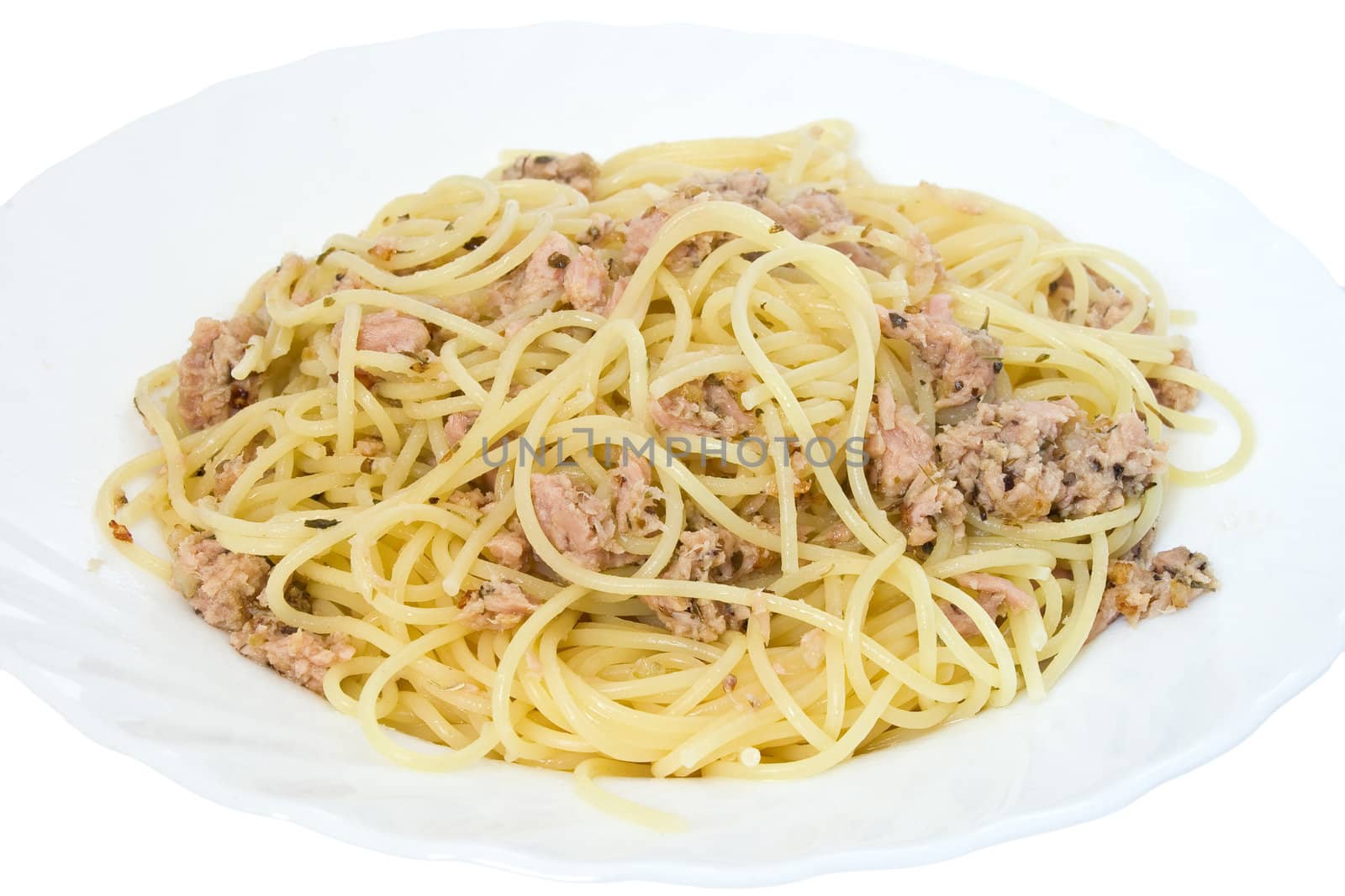 italian dish of spaghetti with tuna and origanum on white background