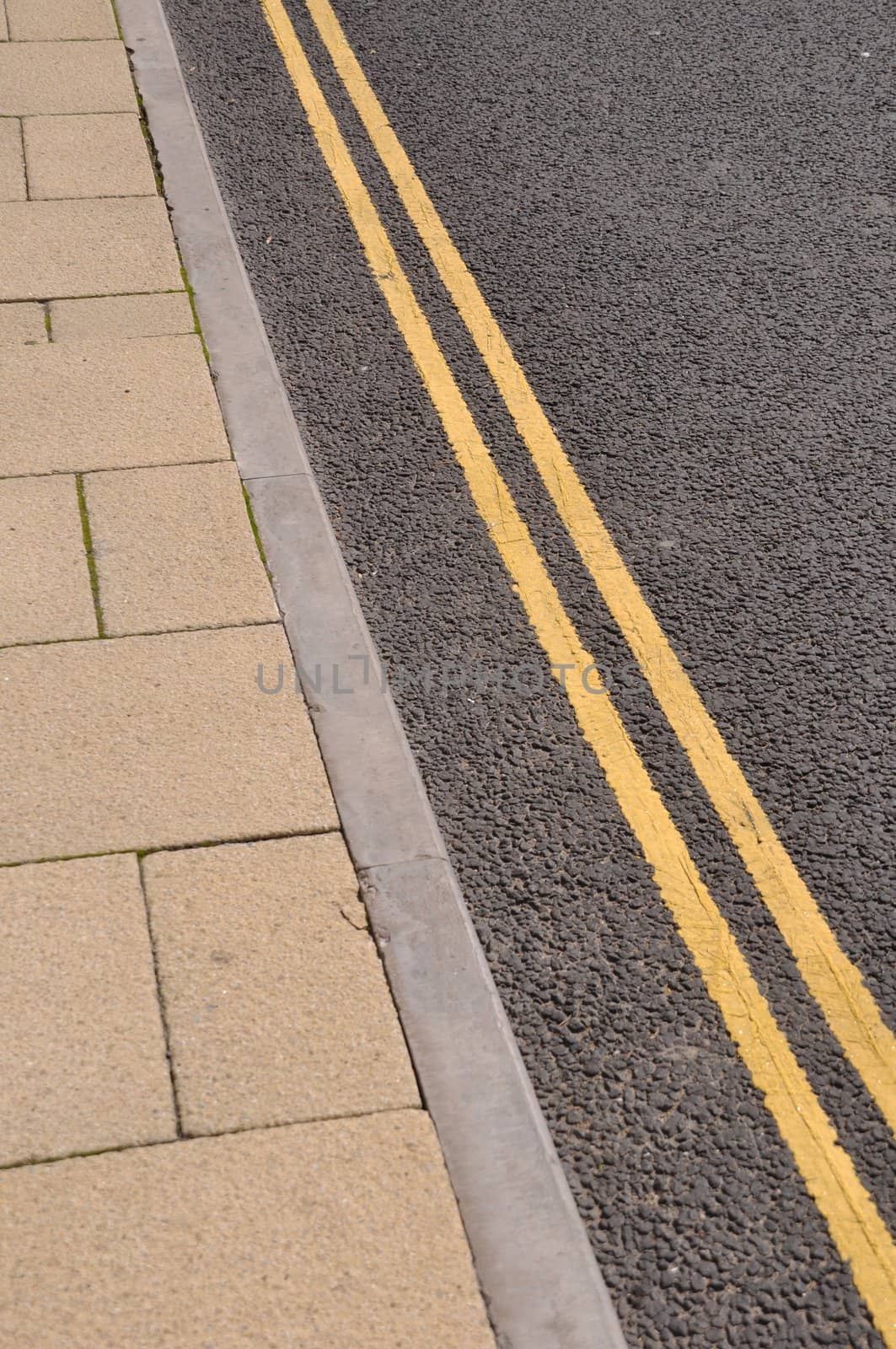 double yellow lines on the asphalt road (forbidden parking)