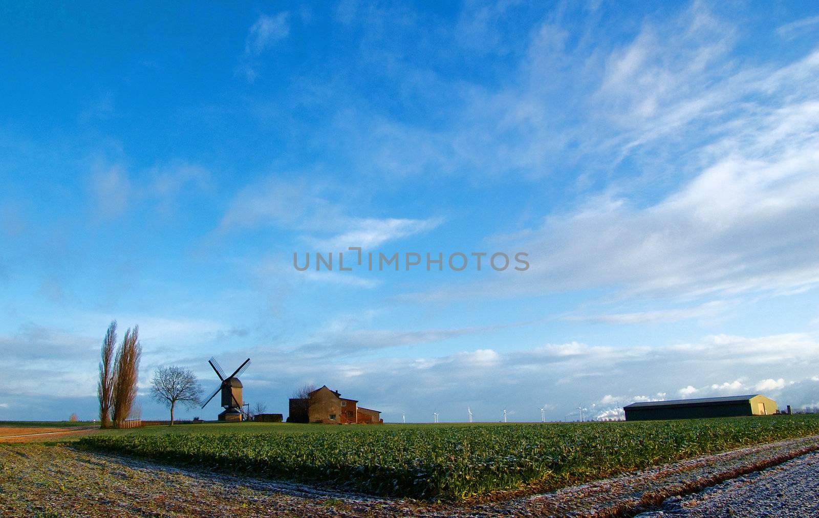 Windmill and clouds by saasemen