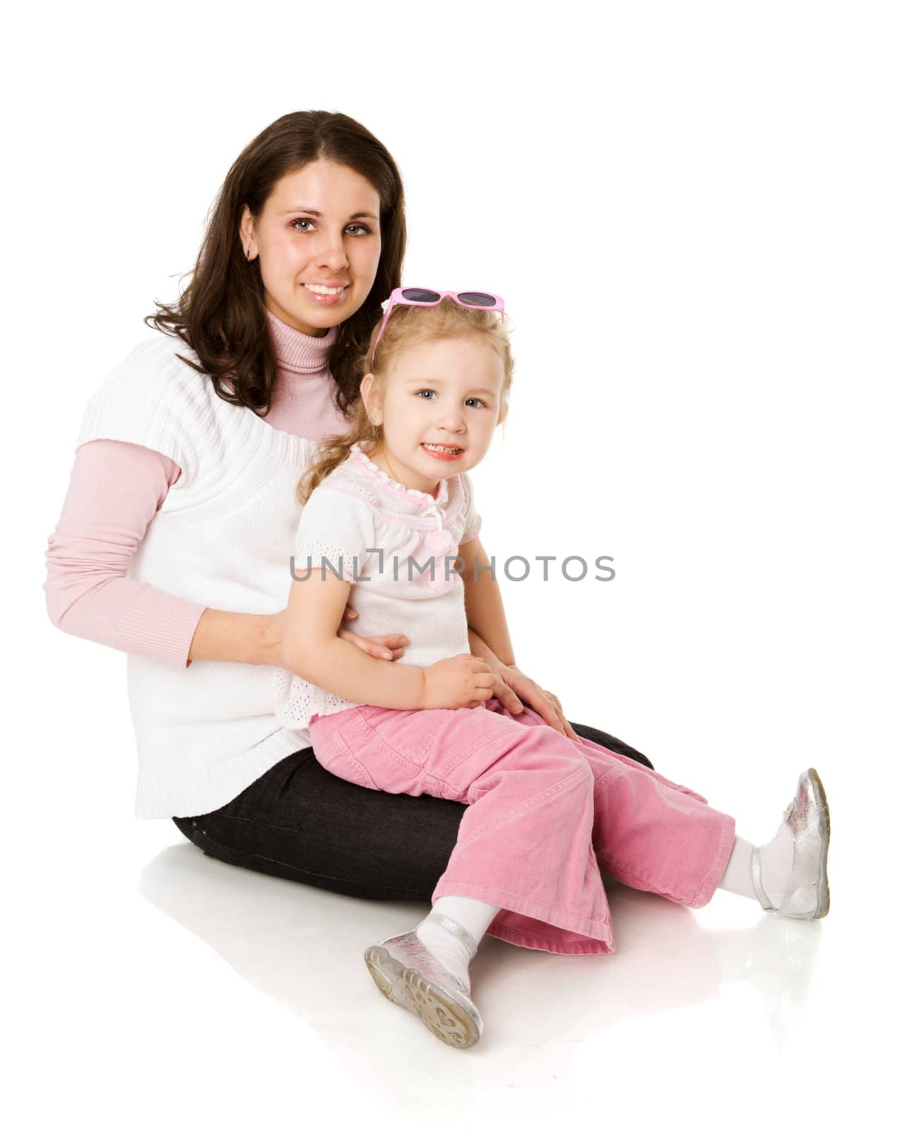 mother and daughter posing together  isolated on white