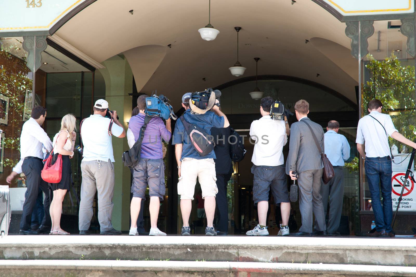 SYDNEY, AUSTRALIA - JANUARY 25: The press gather outside court waiting for subject of hearing to emerge on January 25 2011. High profile court cases create much press interest.