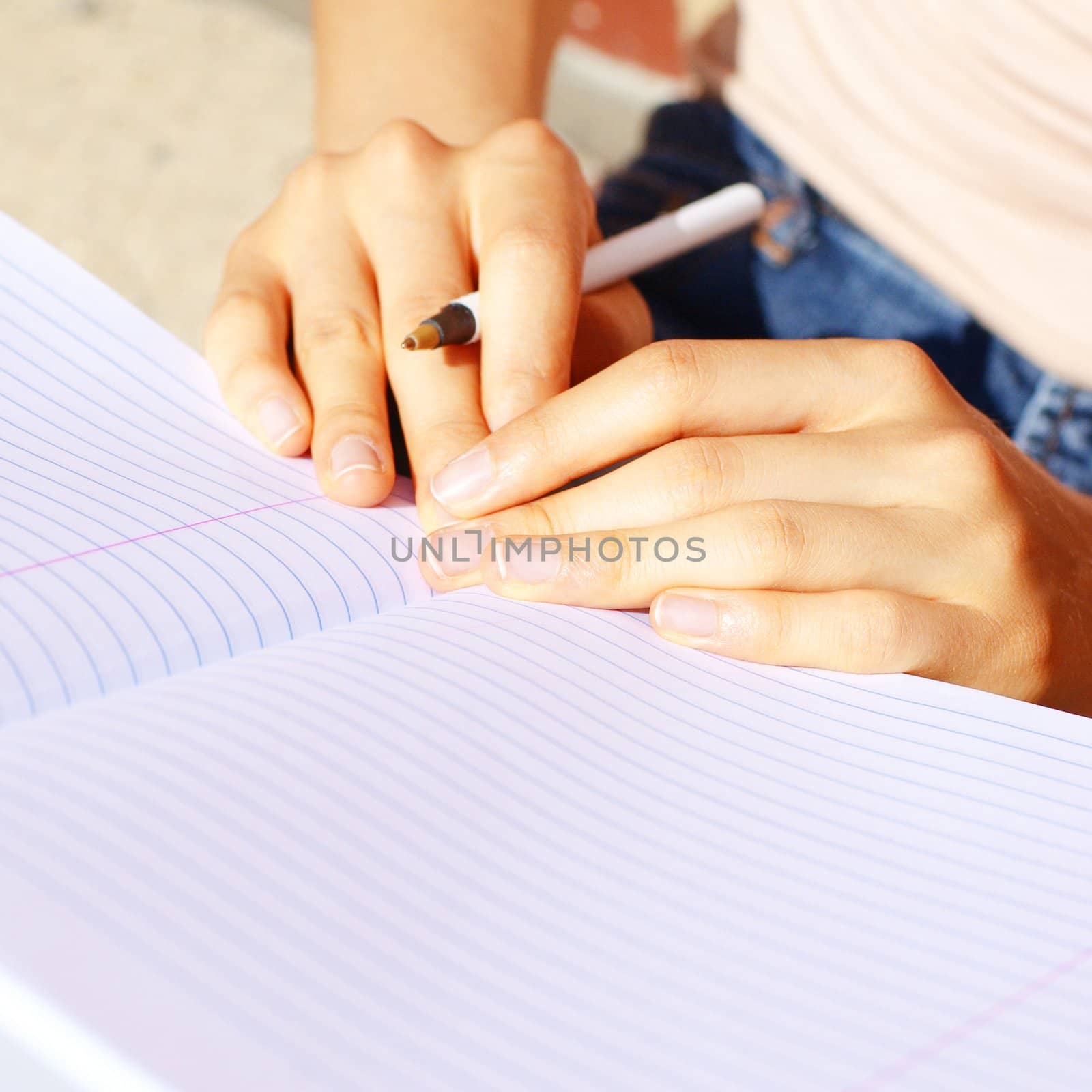 Girl Writing In Note Book by cardmaverick