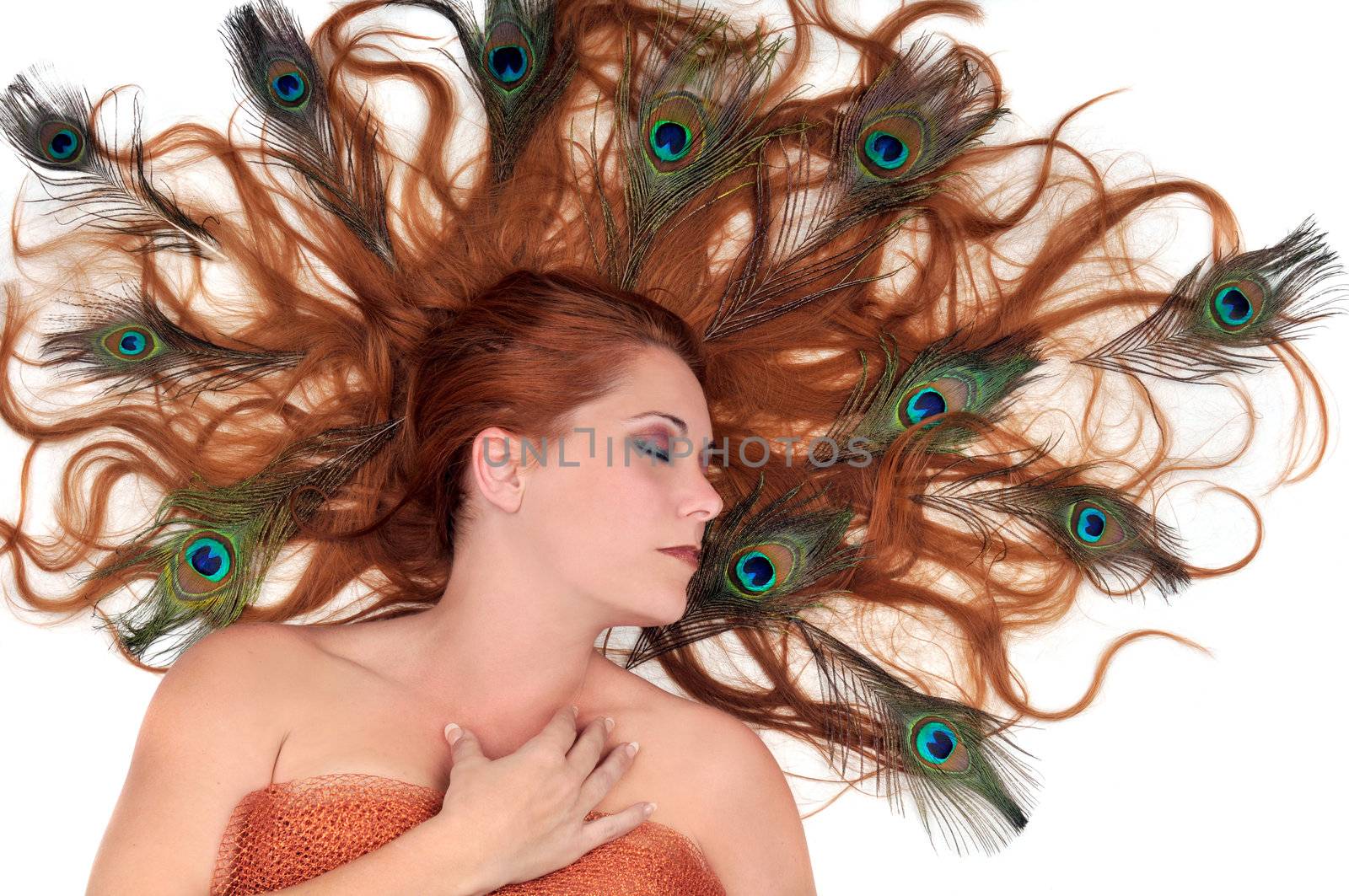 Autumn Fairy Concept - Redhead With Peacock Feathers in Her Hair on White Background