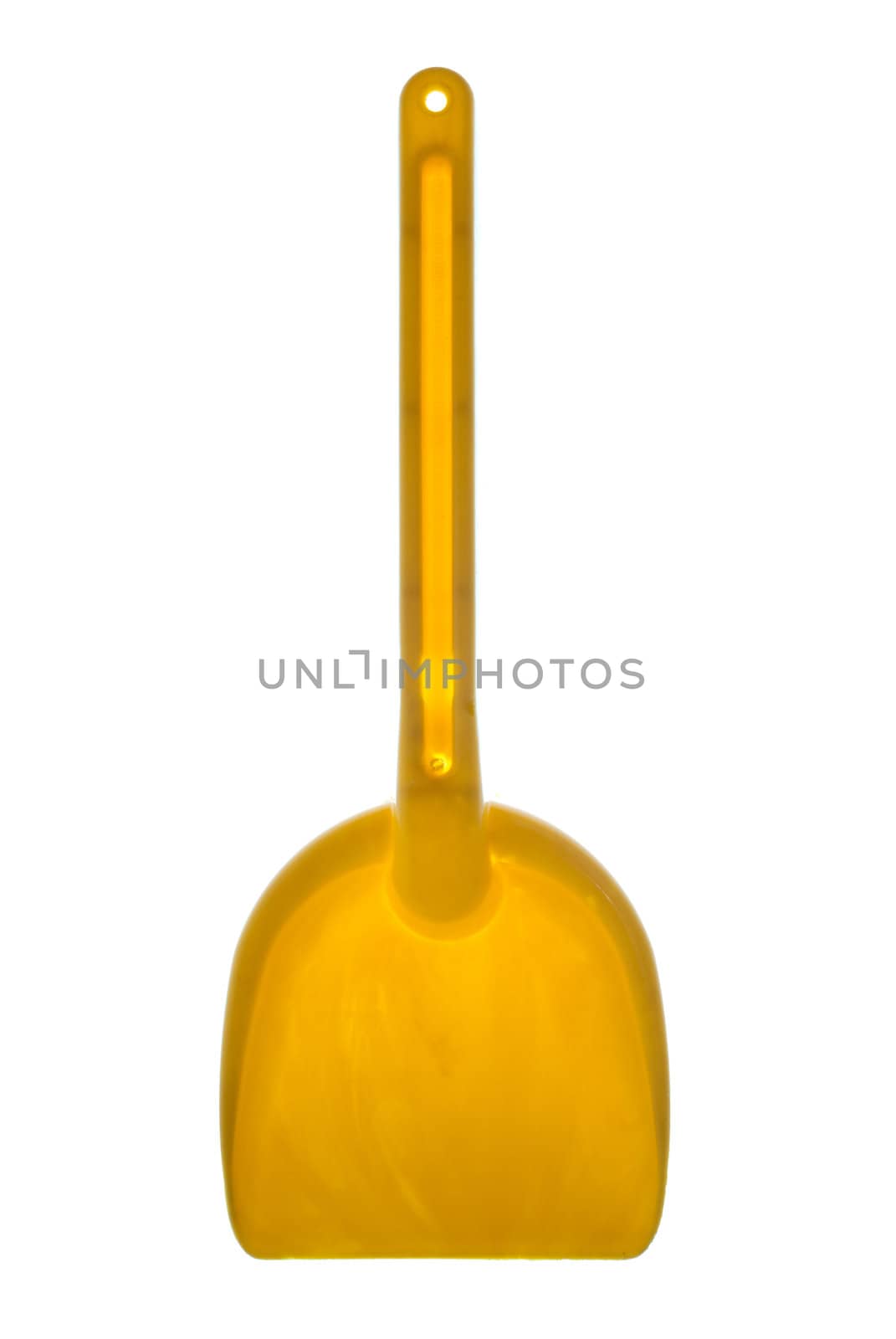 Yellow toy shovel isolated on a white background.