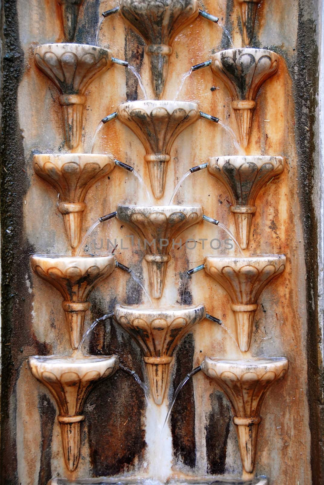 old stone wall rusty fountain texture outdoor