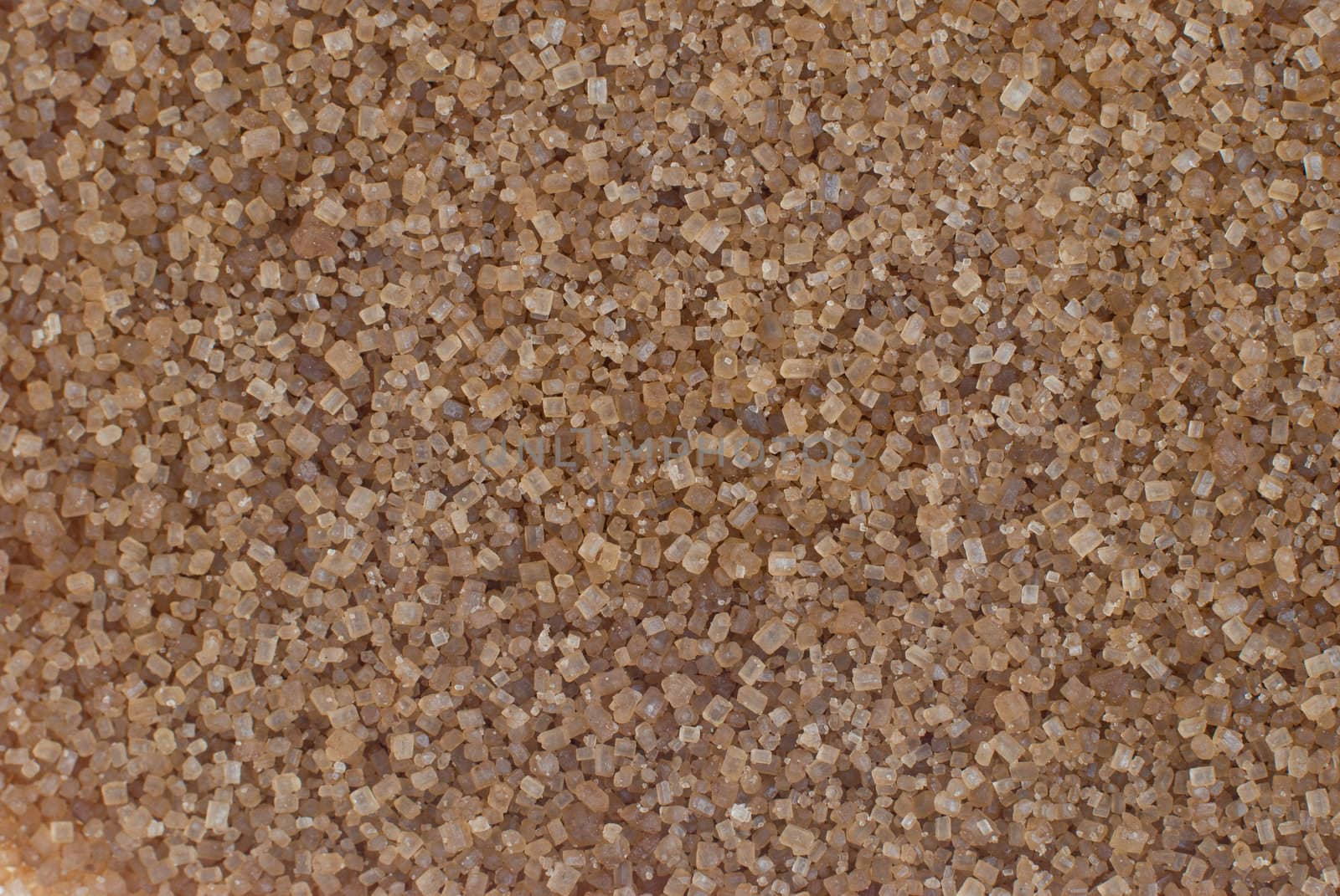 Detail of brown sugar crystals from sugar cane - useful as a background.