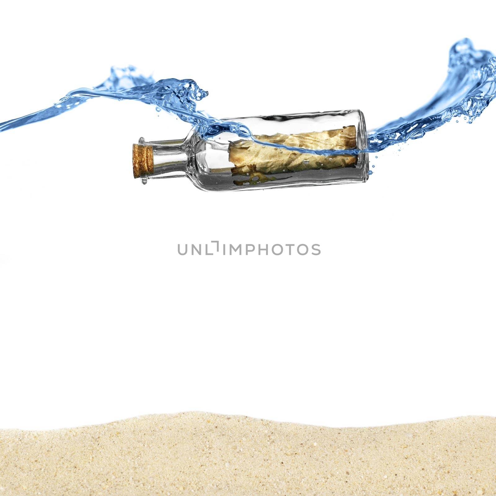 Message in a bottle floating in an ocean above sand.